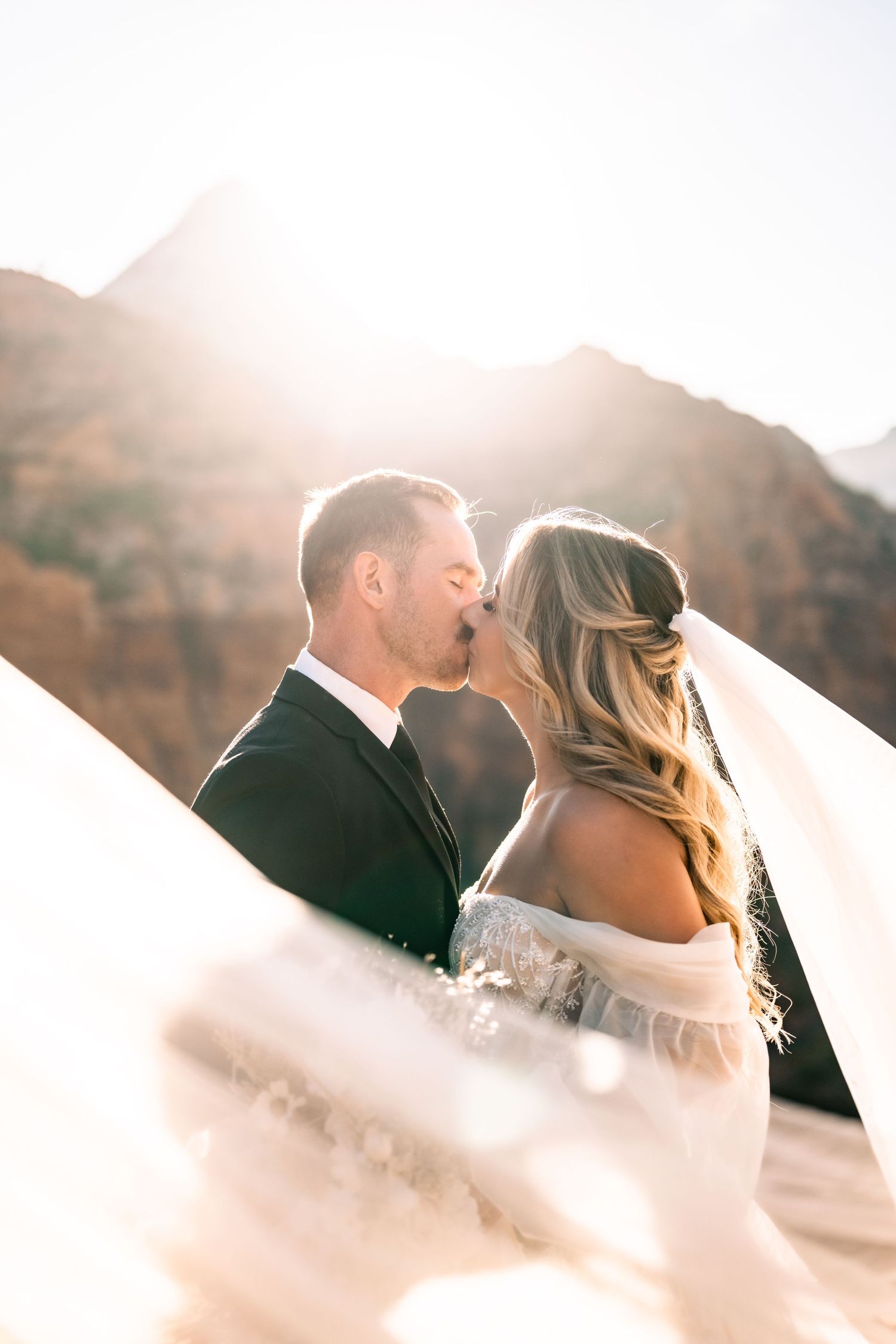Wedding portraits at the Zion Overlook at sunset by Utah Elopement Photographer
