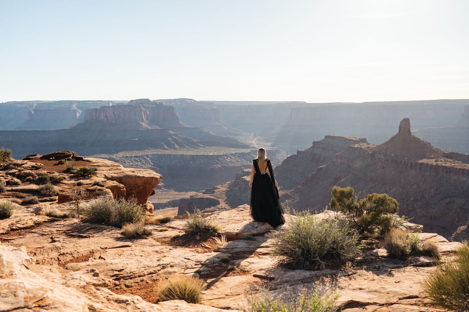 Scenic panoramic view of red rock formations and desert landscape at Dead Horse Point State Park in Utah.