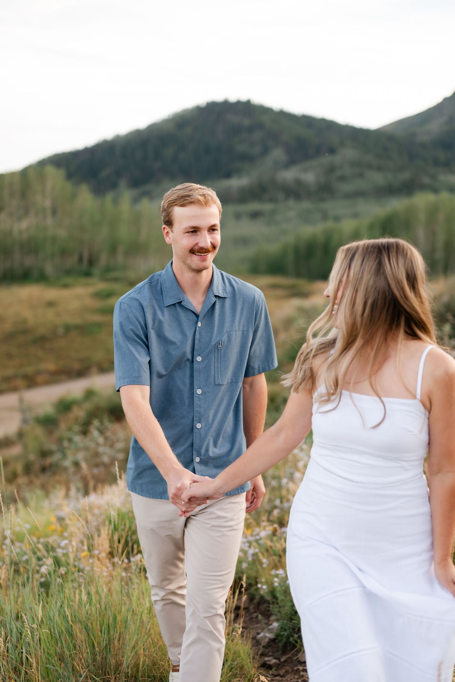 Couple engagement photos in the mountains above Park City.