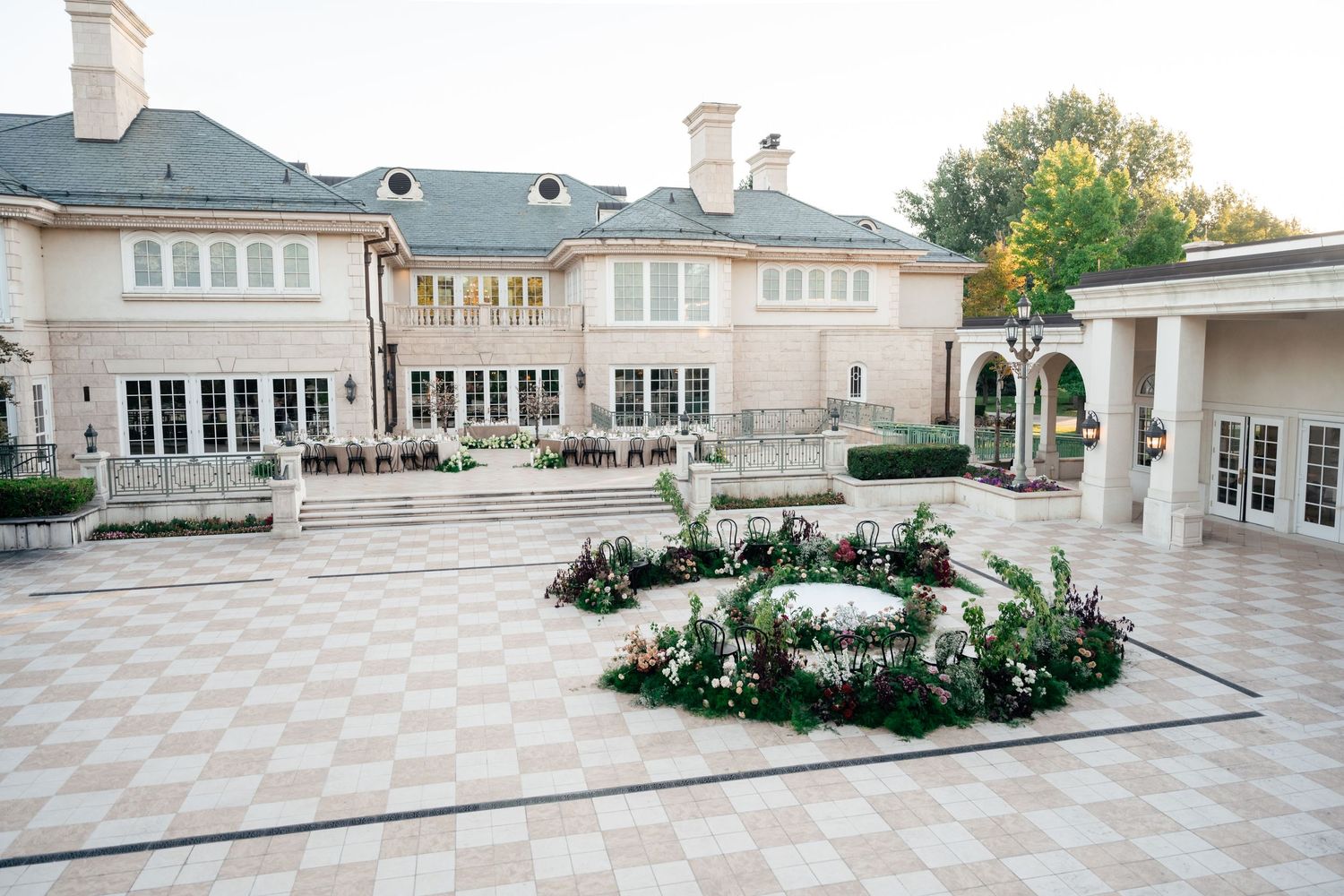 A panoramic view of an elegant white mansion. UVU Museum of Art, a Utah County wedding venue.