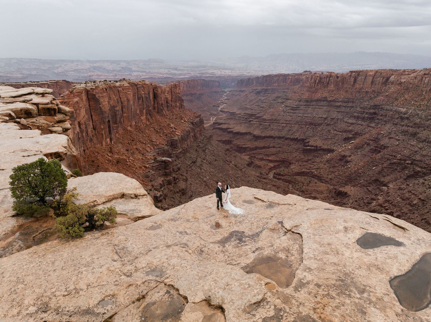 Panoramic view of red rock canyons and desert landscape at Dead Horse Point State Park in Utah.