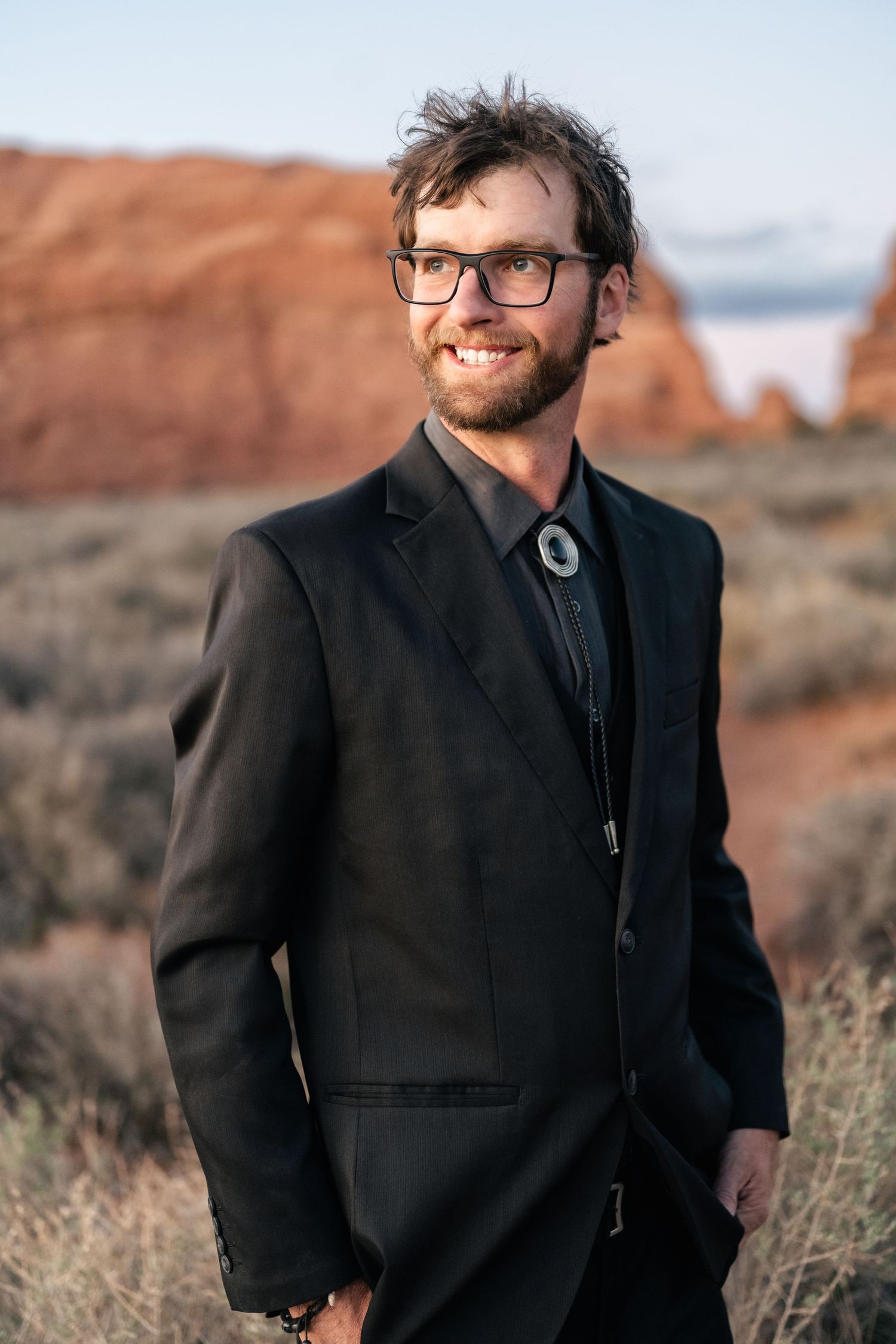 Groom portrait during Arches National Park Elopement by Utah elopement photographer and videographer
