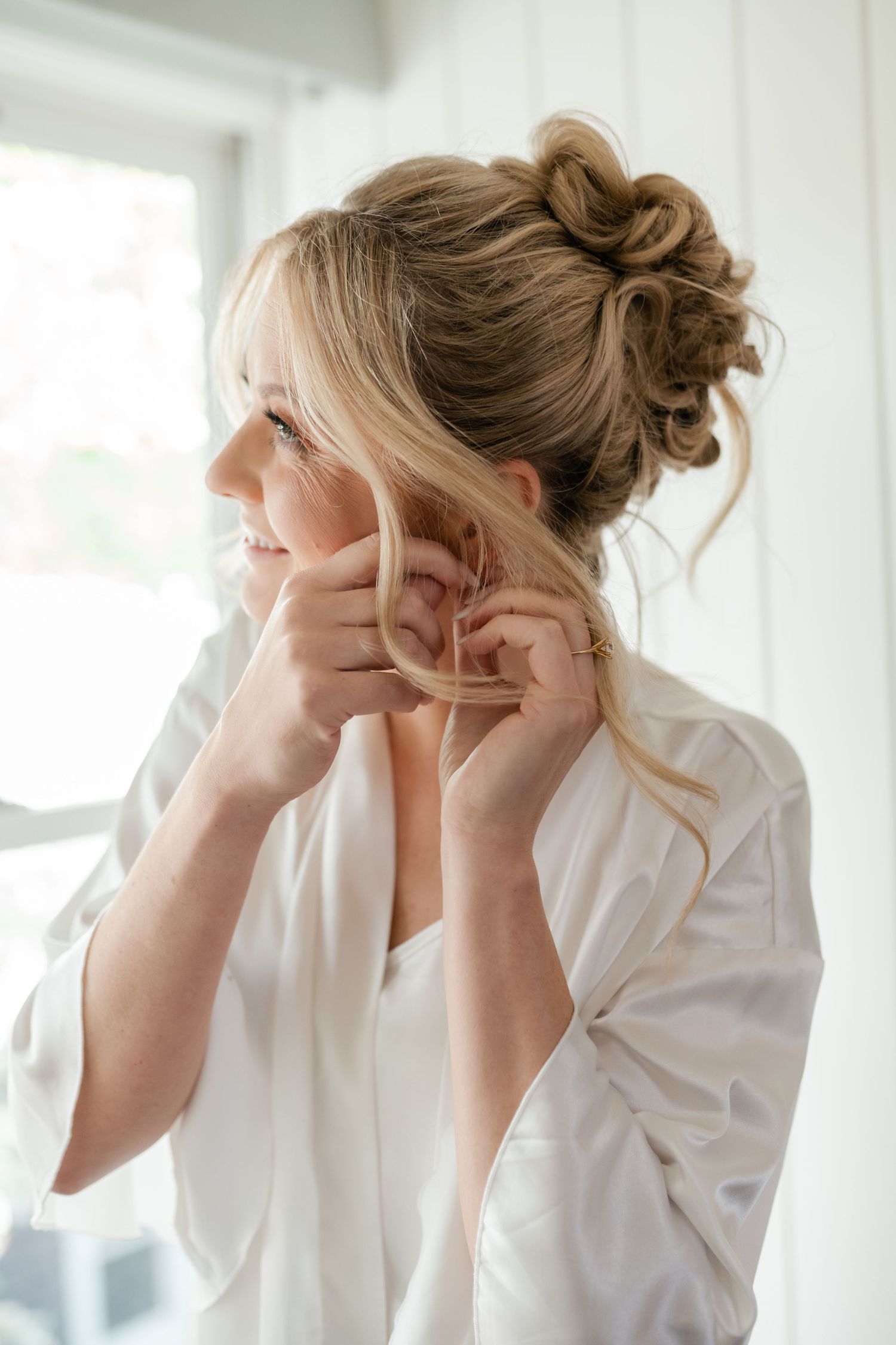 Series of photos showing hair styling preparation in bright white morning light.