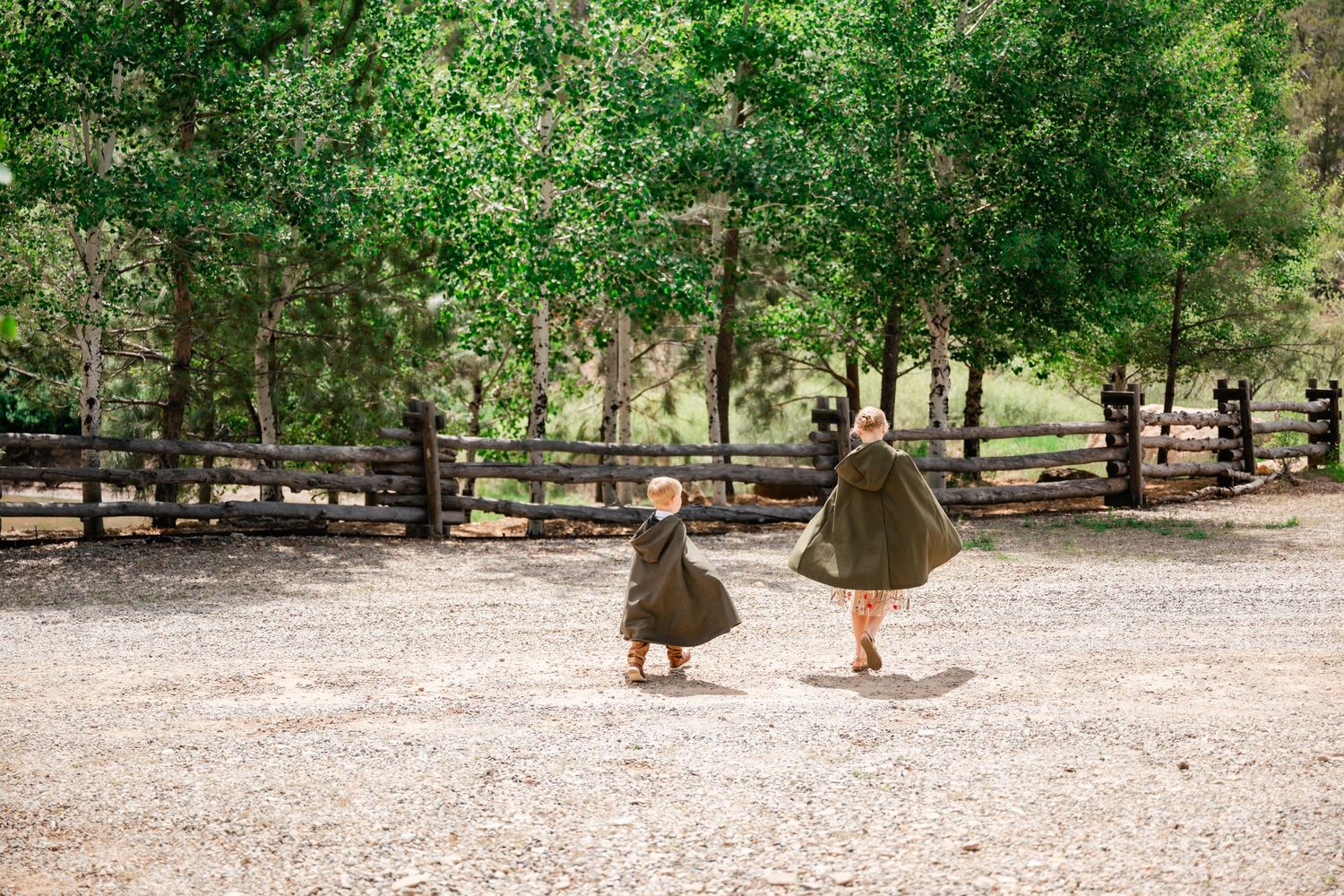 Outdoor garden venue with natural pathways and trees creating a serene wedding setting.