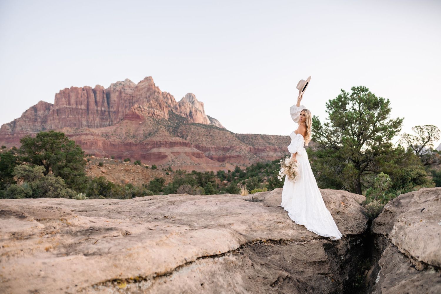 Utah elopement photographer captures the romance of a desert sunrise bridal session