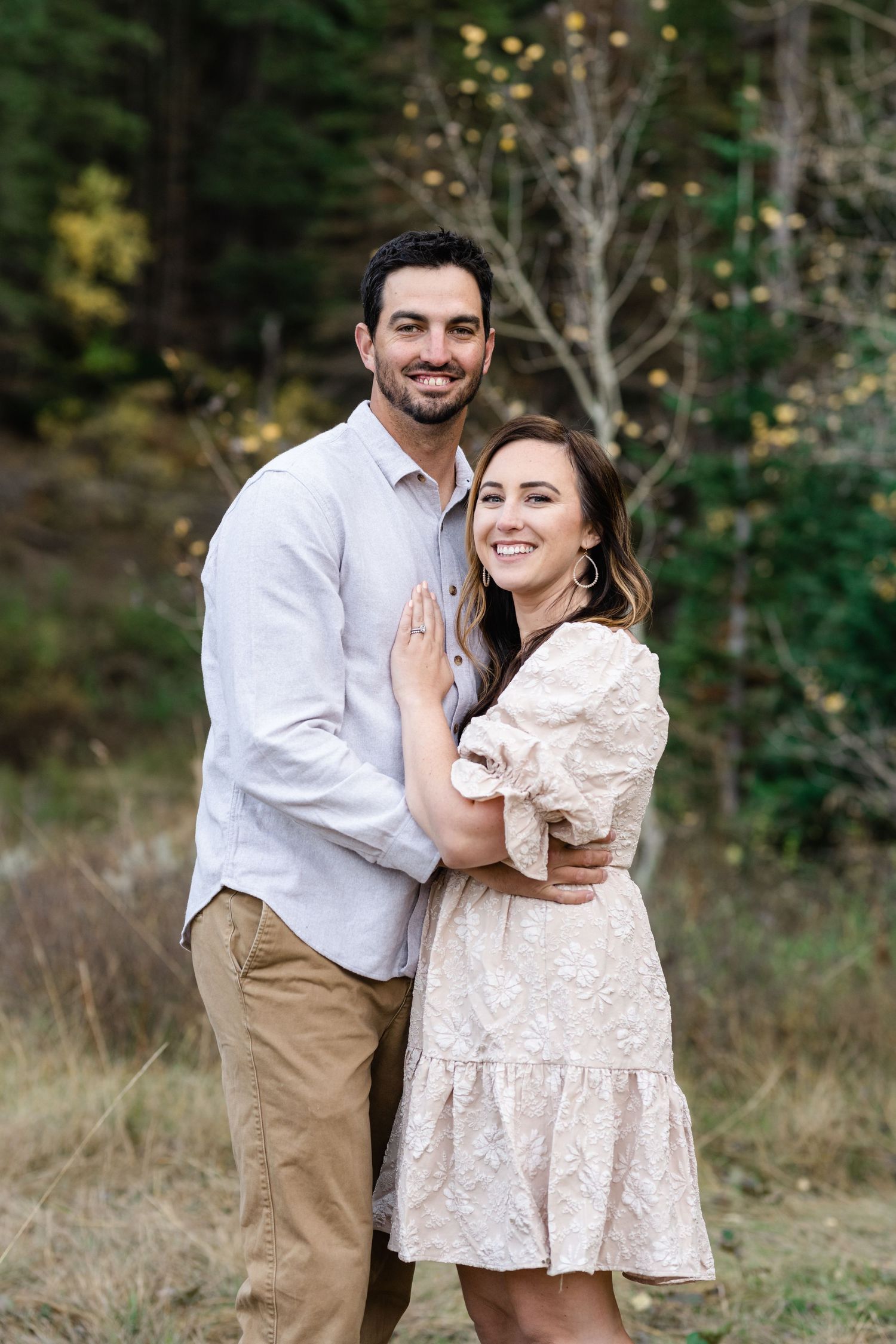 Husband and wife smiling portrait during their fall family photos by Utah family photographer, Coley Cook