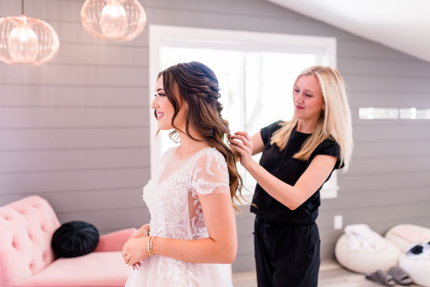 A series of bridal preparation photos showing hair styling and getting ready moments in a light filled room. River Bridge Event Venue.