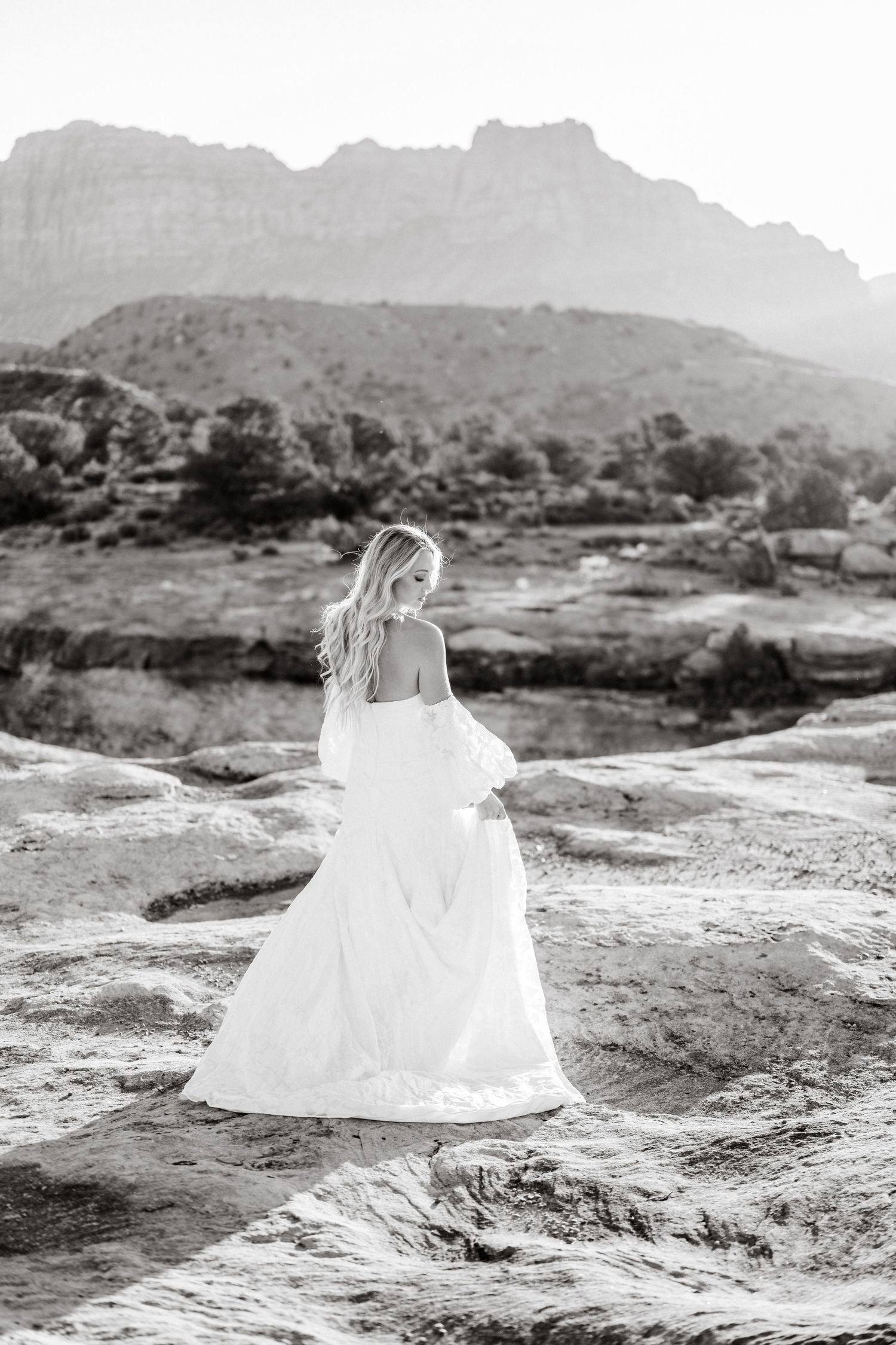 Utah elopement photographer captures the romance of a desert sunrise bridal session