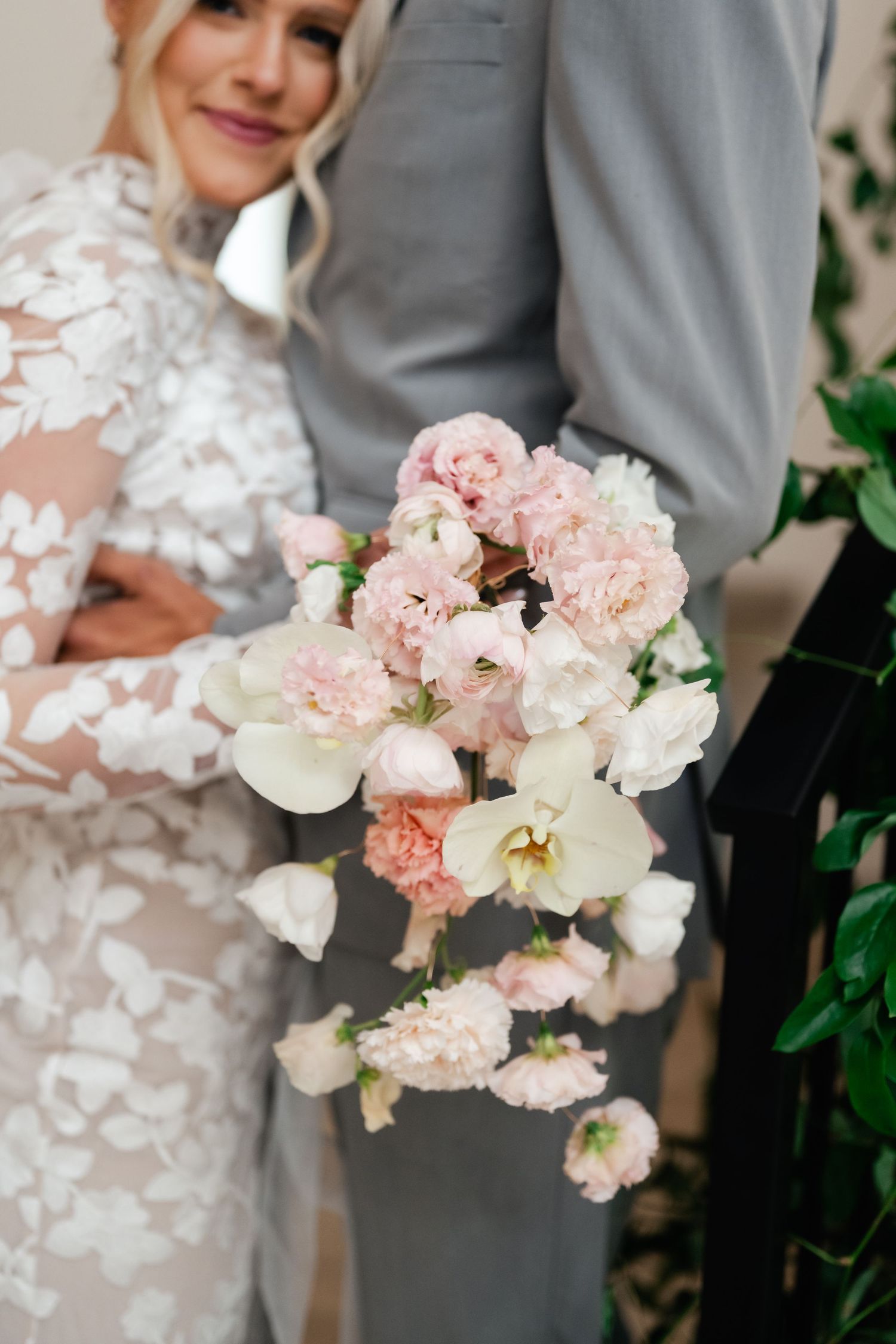 Trailing, delicate bridal bouquet detail photo. Utah Wedding Photographer. Utah Wedding Venue. Moments on Main. Best Wedding Photographer.