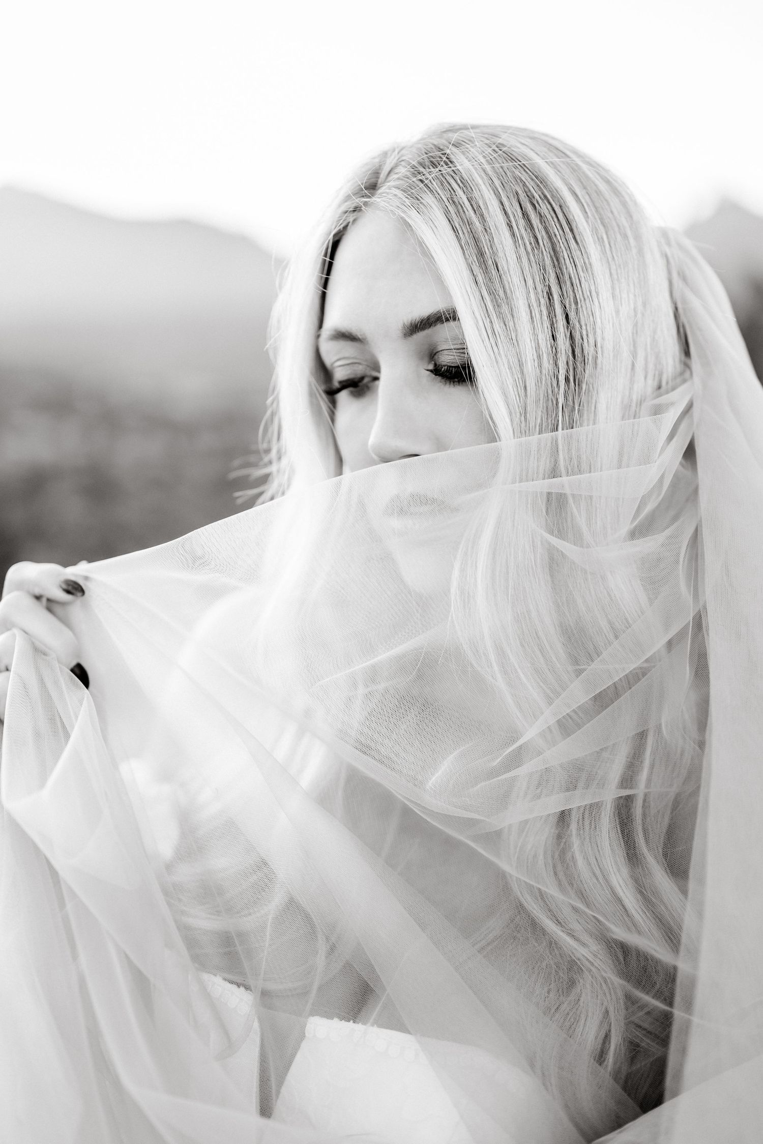 Ethereal desert sunrise bridal photoshoot captured by a Utah elopement photographer
