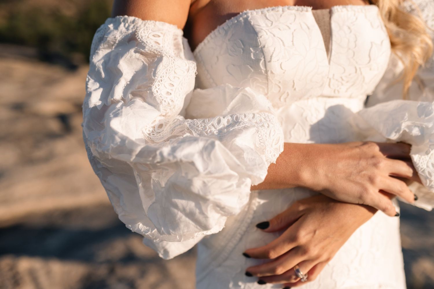 Bridal sleeve detail photograph during desert bridal session