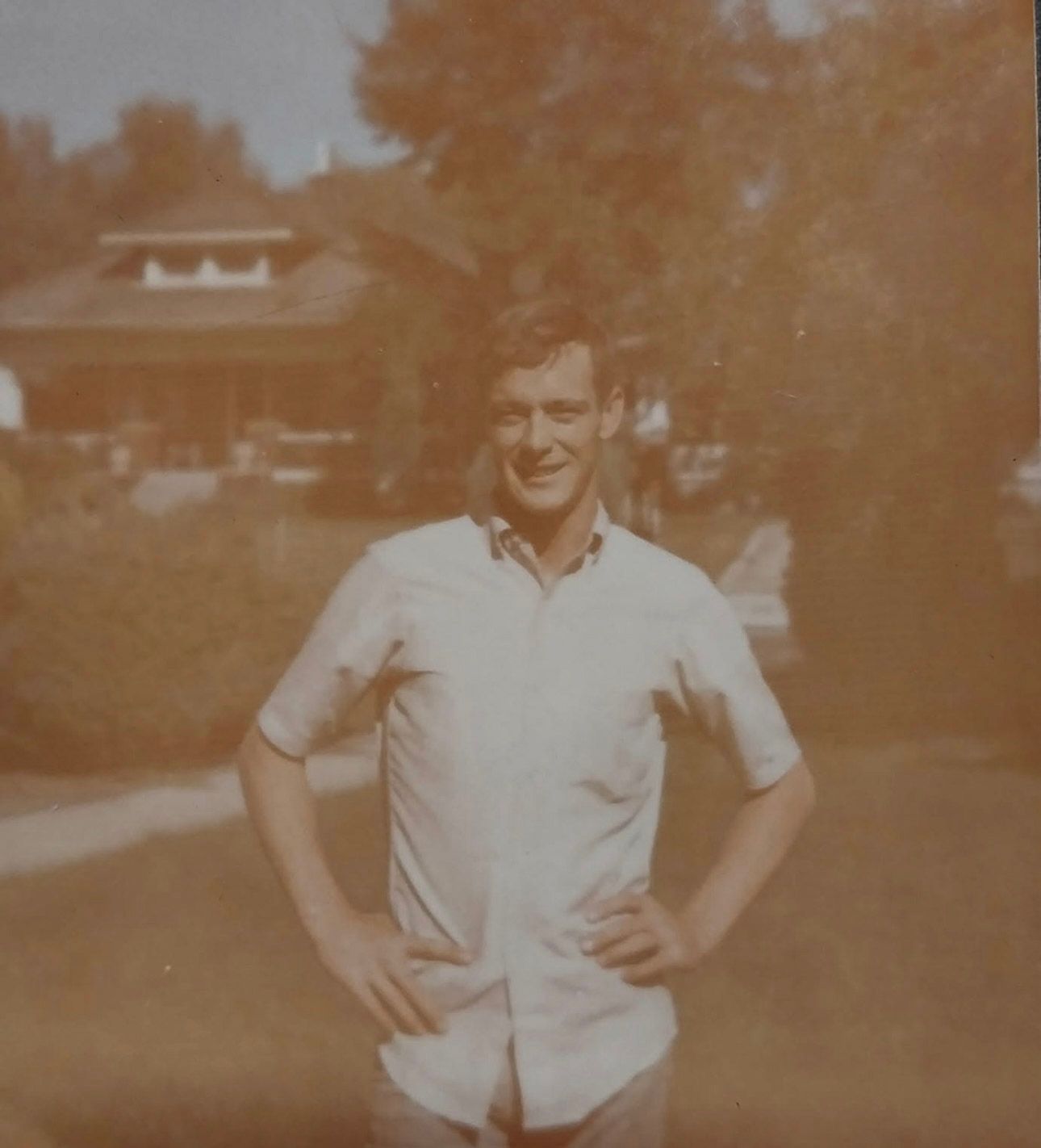 A sepia-toned photo strip showing three similar casual portrait poses of a person in a light-colored shirt.