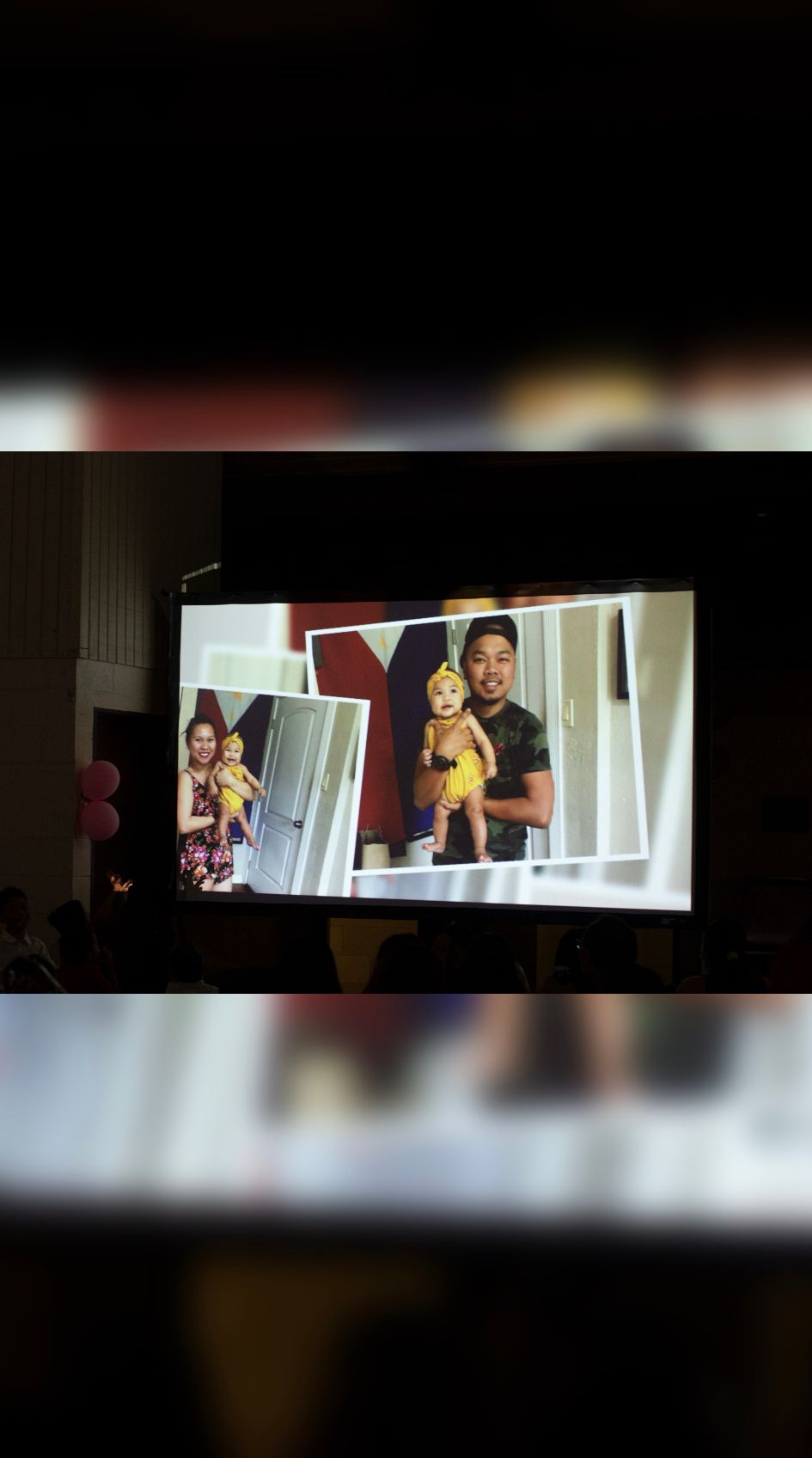 Photo of slideshow, featuring previous clients displayed by projector and projection screen.