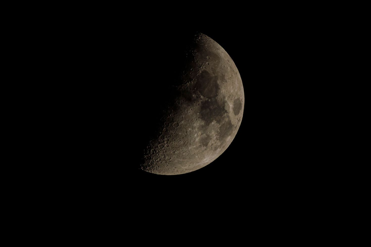 A sequence of six lunar phases showing the moon gradually waning from full to crescent against a dark night sky.