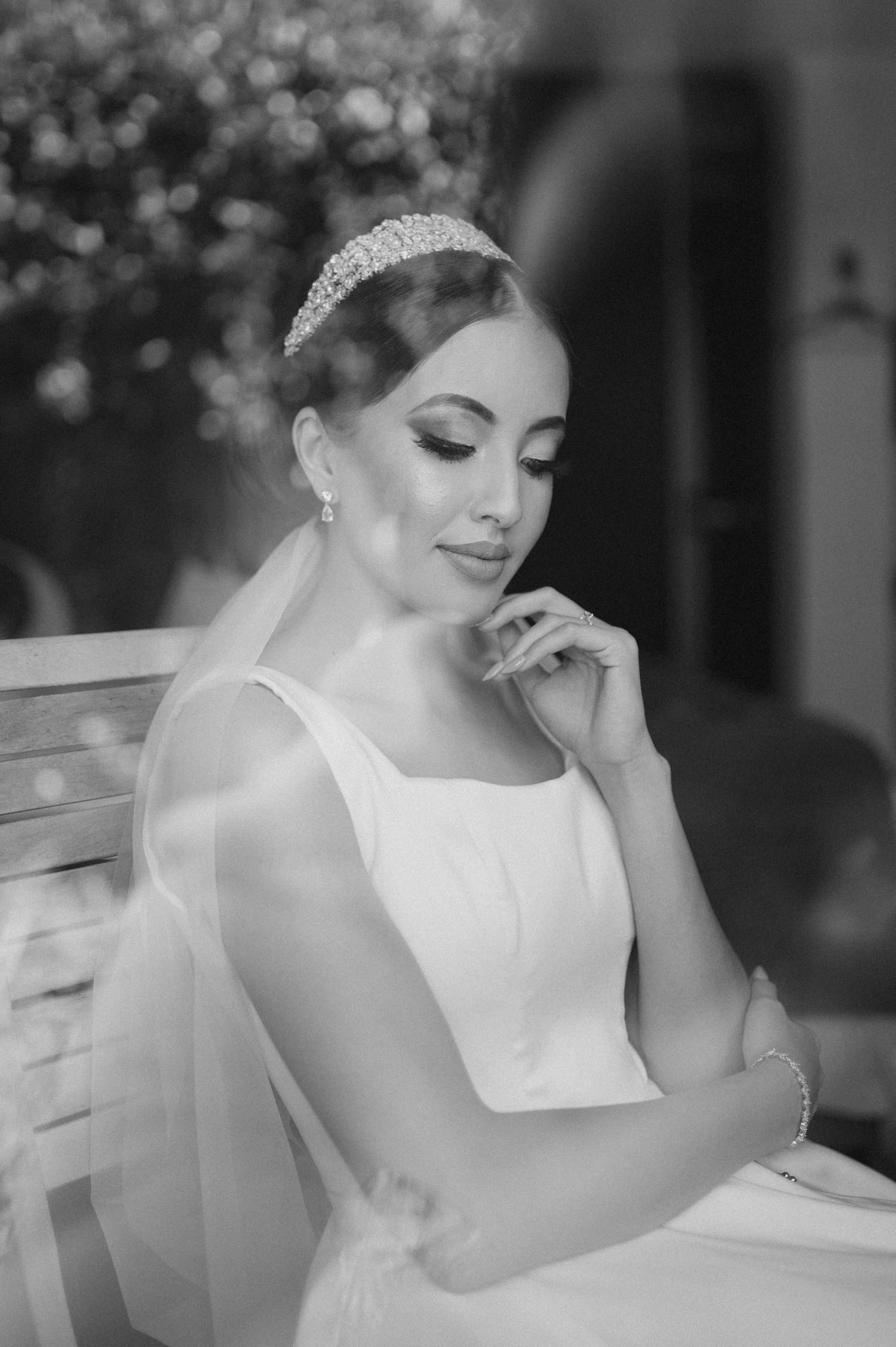 Classic bridal portrait in black and white with tiara and veil.