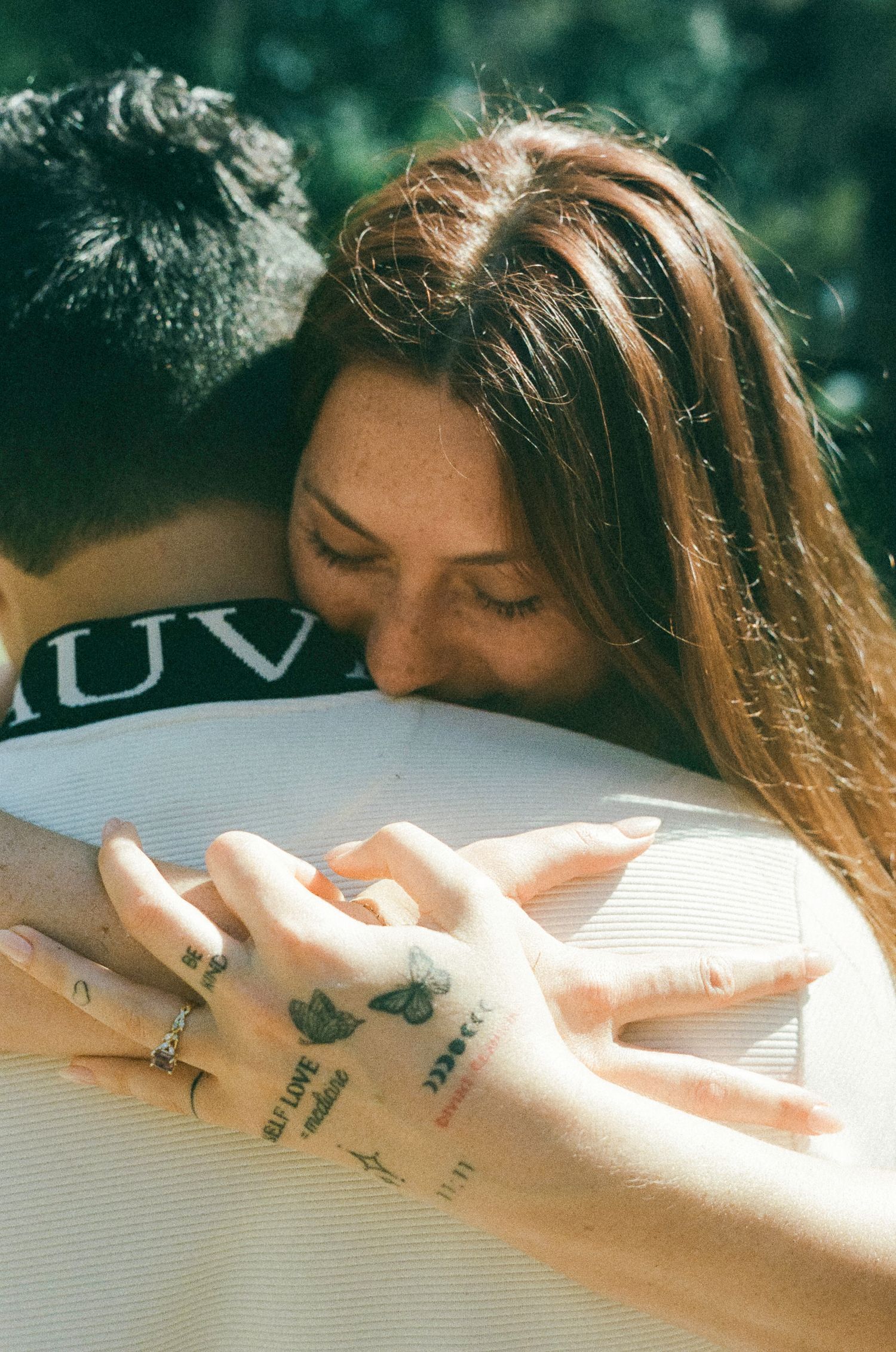 A sequence of intimate close-up shots showing a couple sharing tender moments together in soft natural lighting.