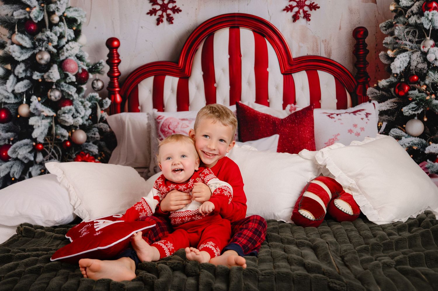 A series of holiday photos with red and white striped decor, Christmas trees, and snow-like settings for festive portraits.