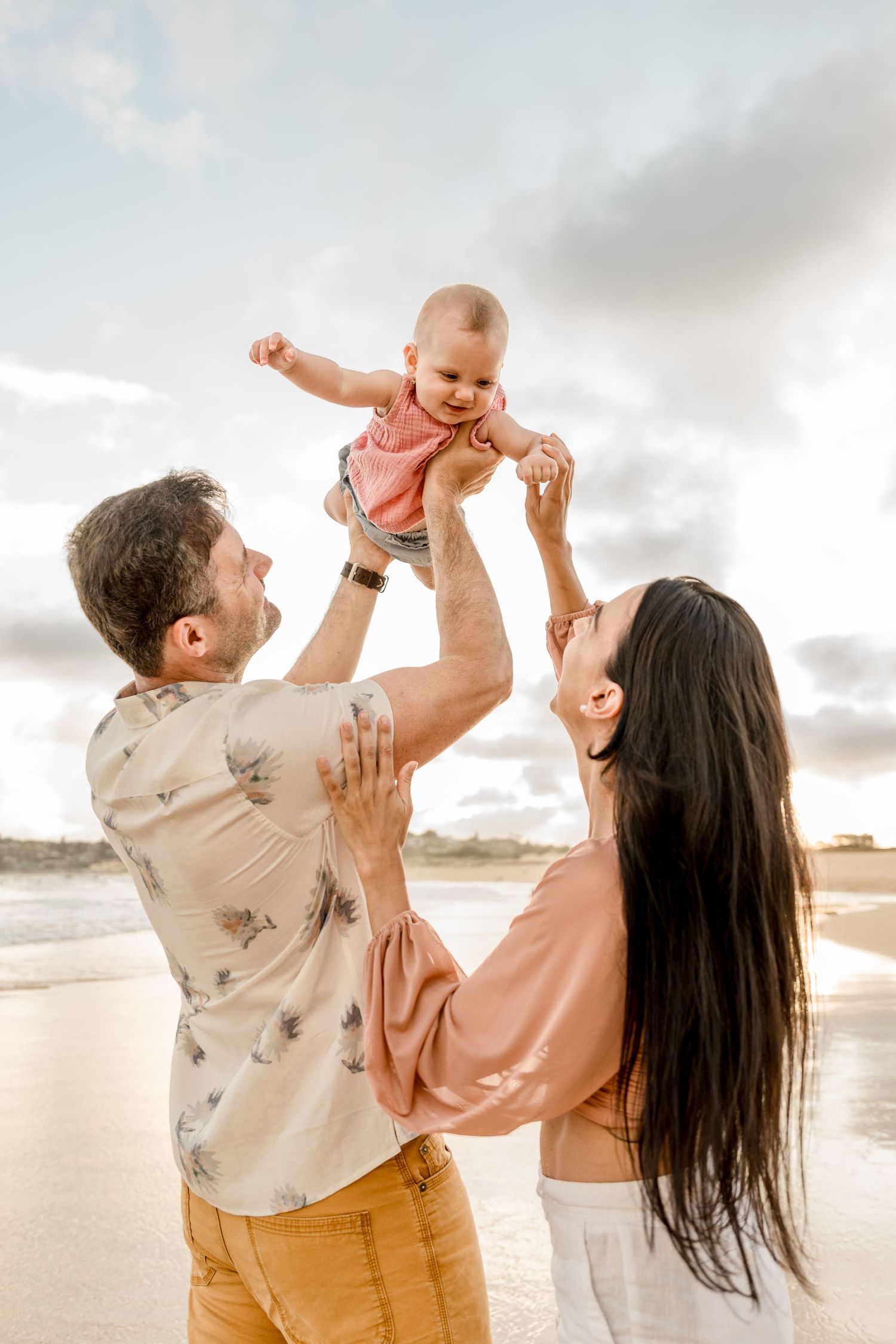 Candid family photo at the North Curl Curl beach from Hey Qiao Photo