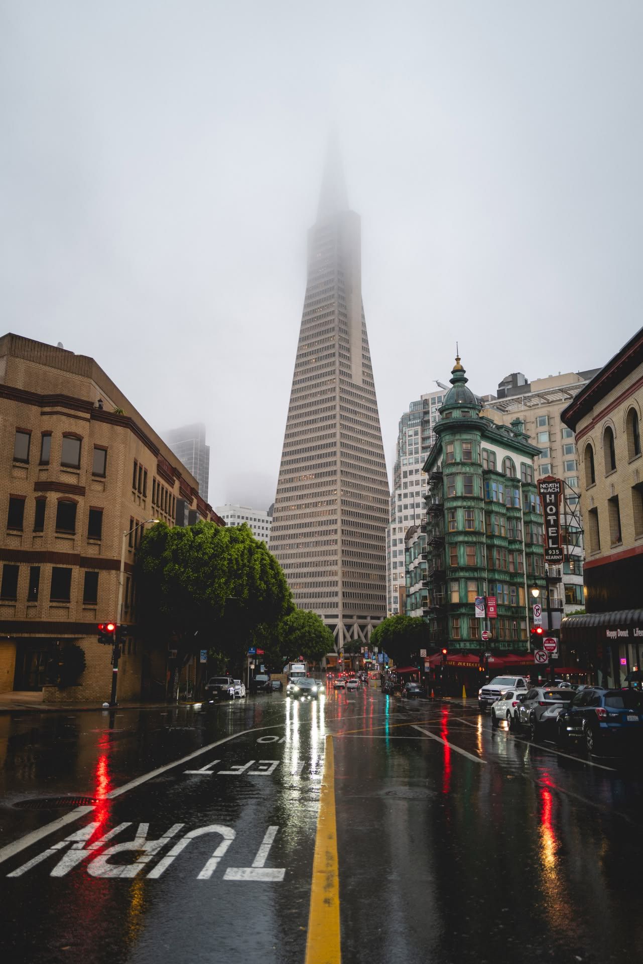 Transamerica Pyramid shrouded in fog on a rainy day in downtown San Francisco.