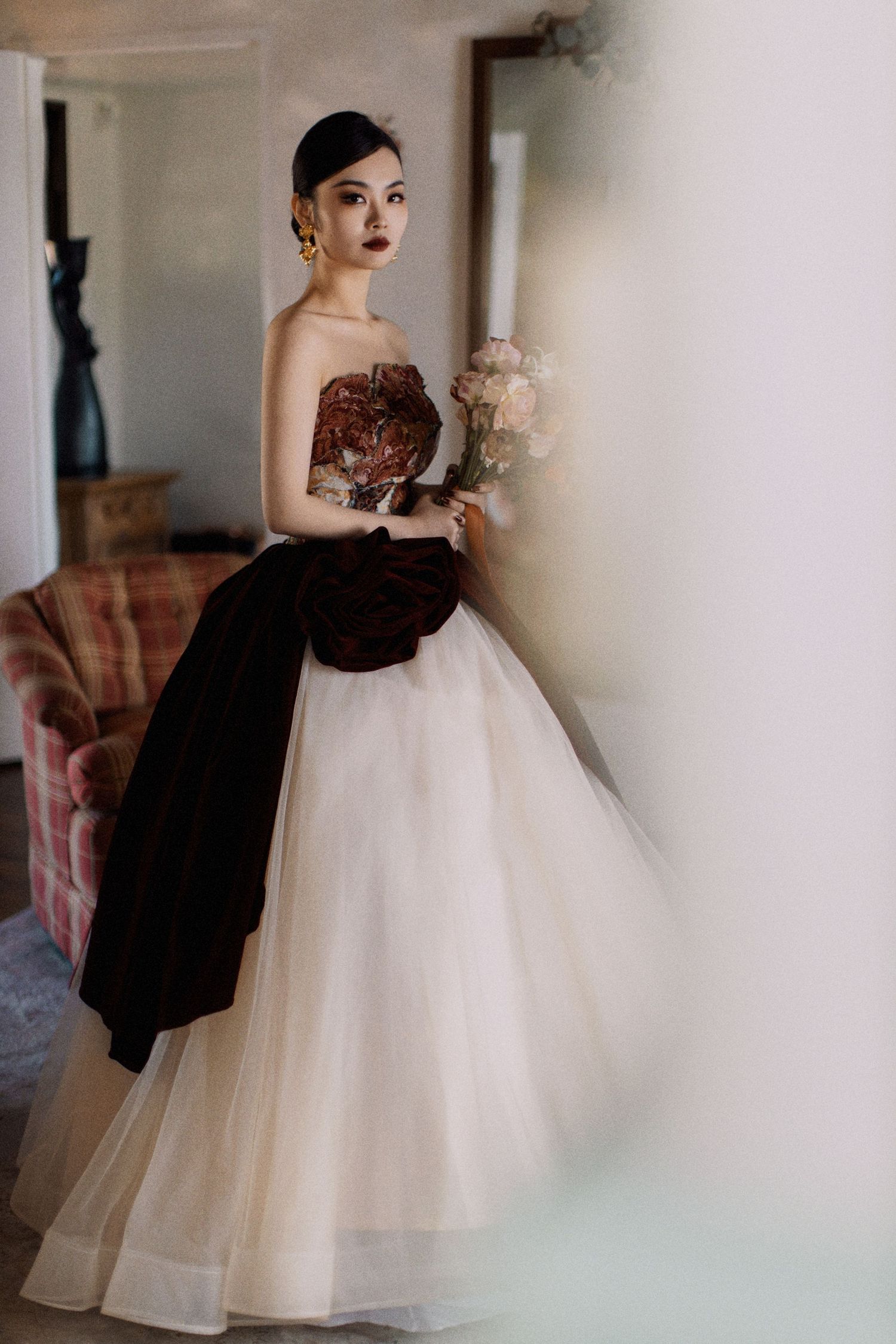 A stunning black and white ball gown wedding dress with strapless bodice and full tulle skirt.