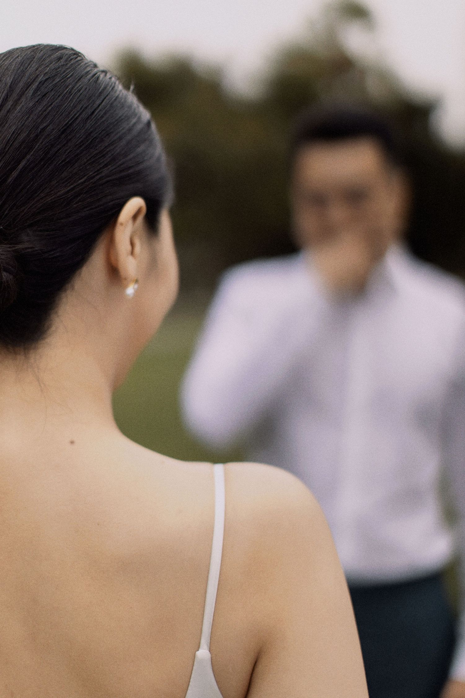 Romantic outdoor couple portrait with selective focus.