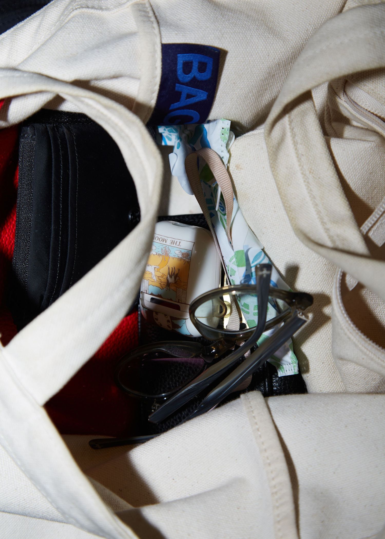A close-up of clothing tags and labels in white fabric.