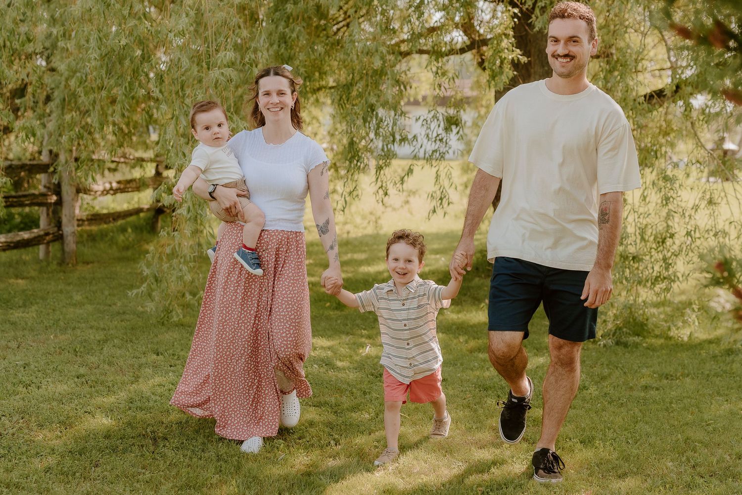 A series of candid family photos taken outdoors in a sunlit grassy area during golden hour.