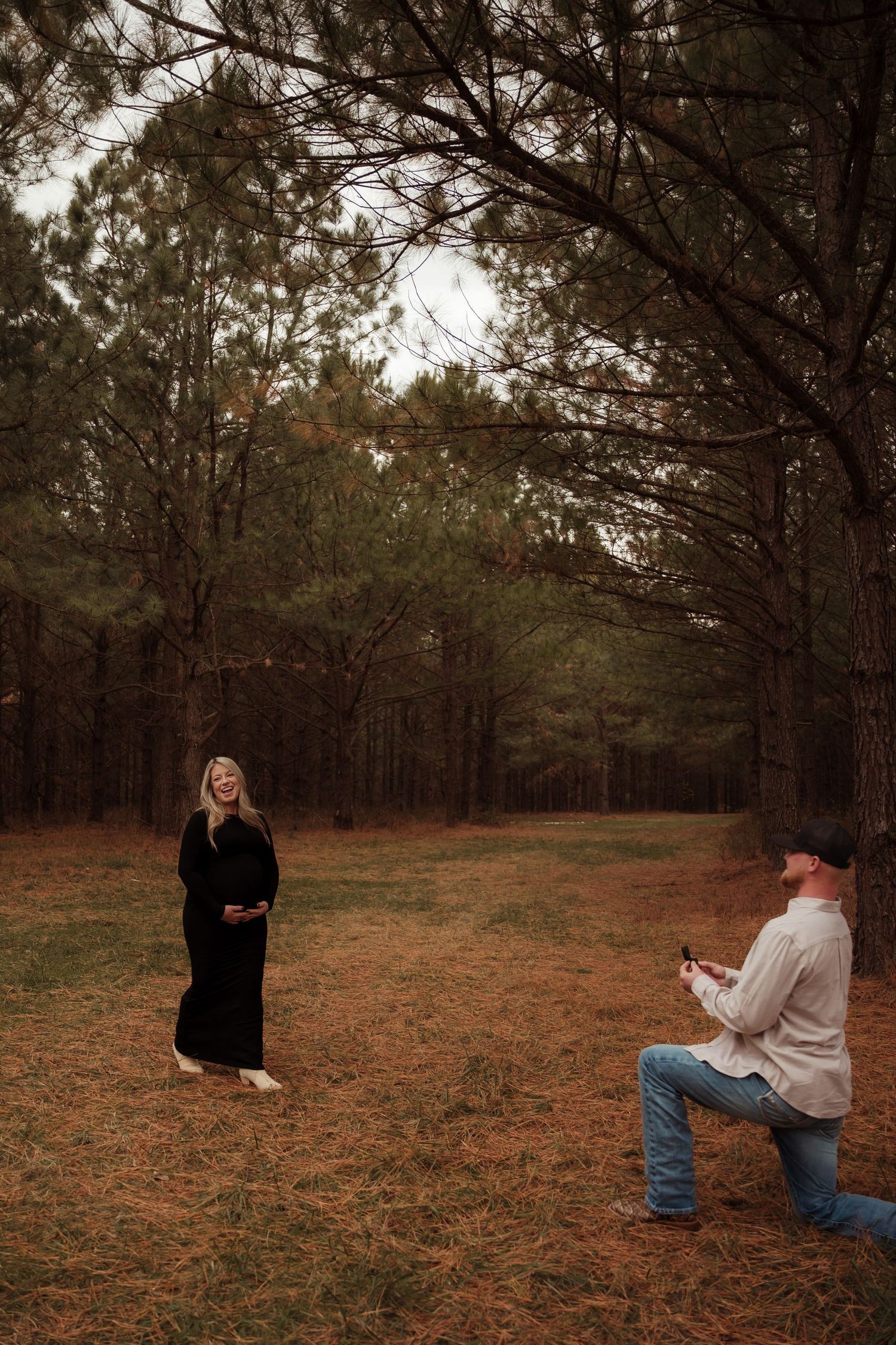 Proposal photoshoot sequence captured in a wooded autumn setting.