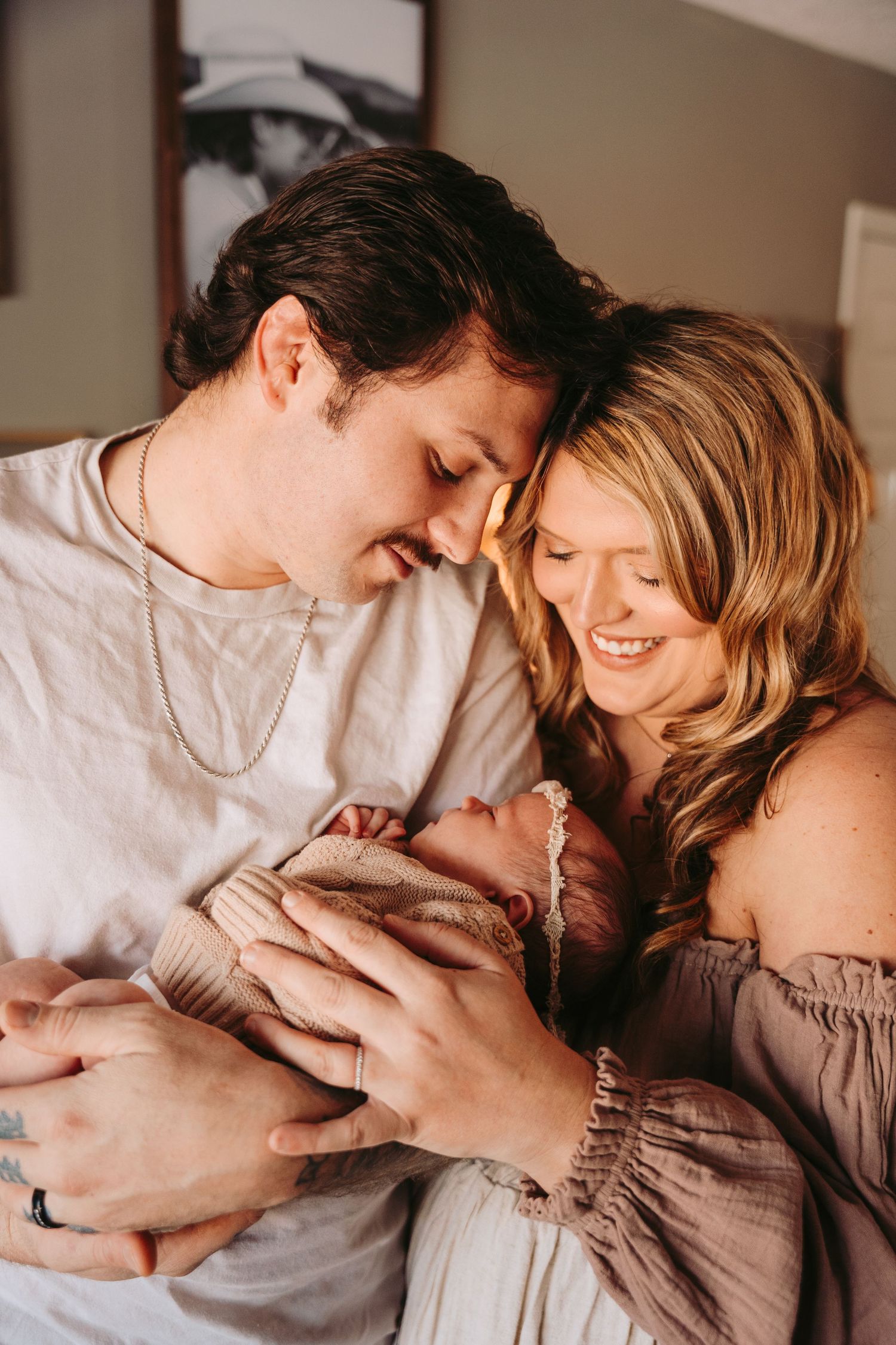 Series of tender moments between a couple in neutral tones showing emotional connection.