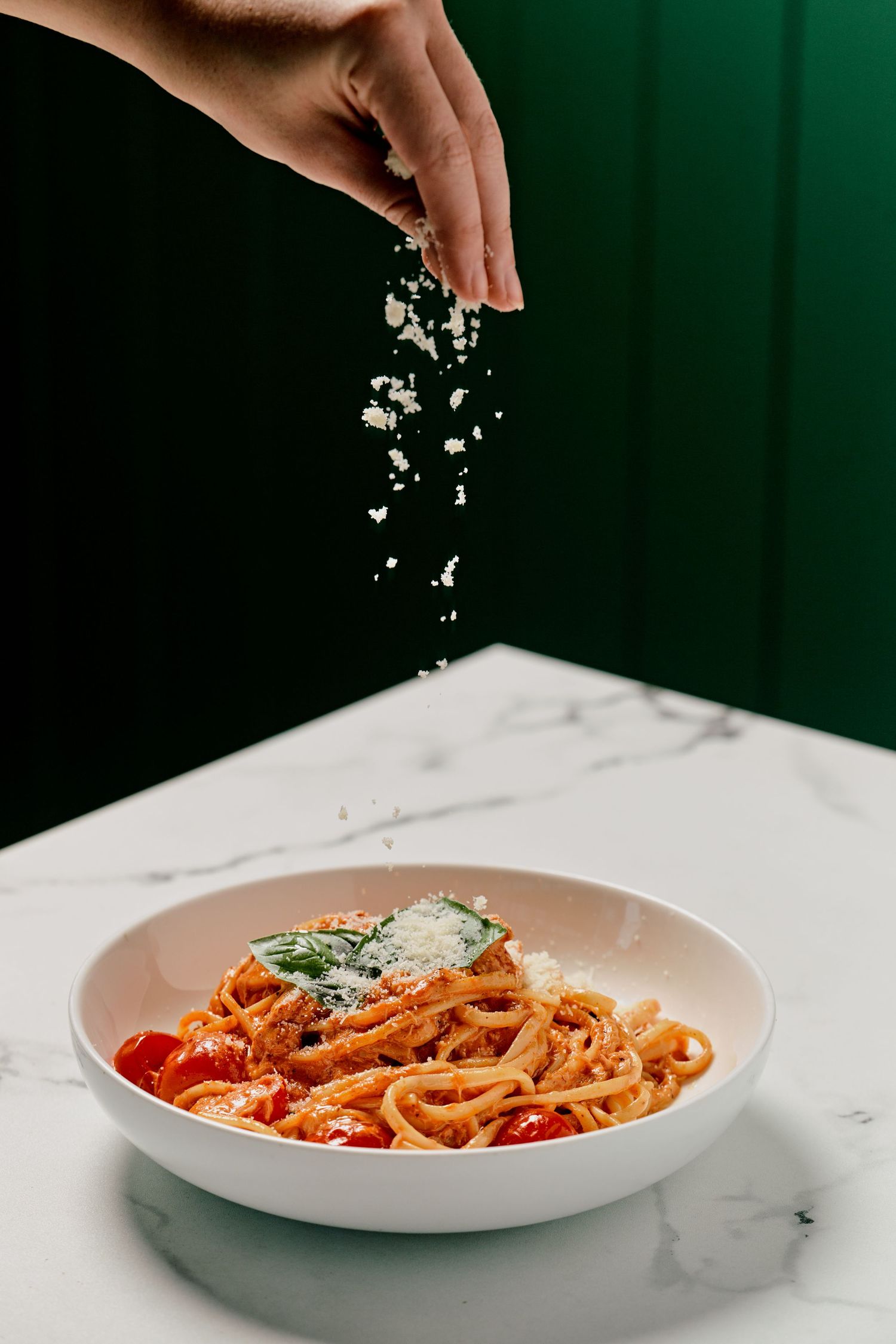 Freshly made tagliatelle with basil pesto and toasted pine nuts