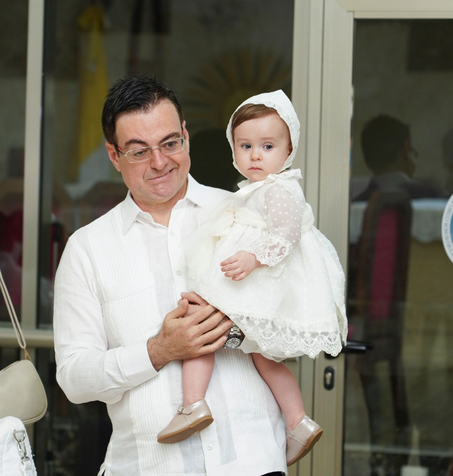 Fotografía profesional , bautizo familiar y con amigos. Ceremonia en la iglesia.