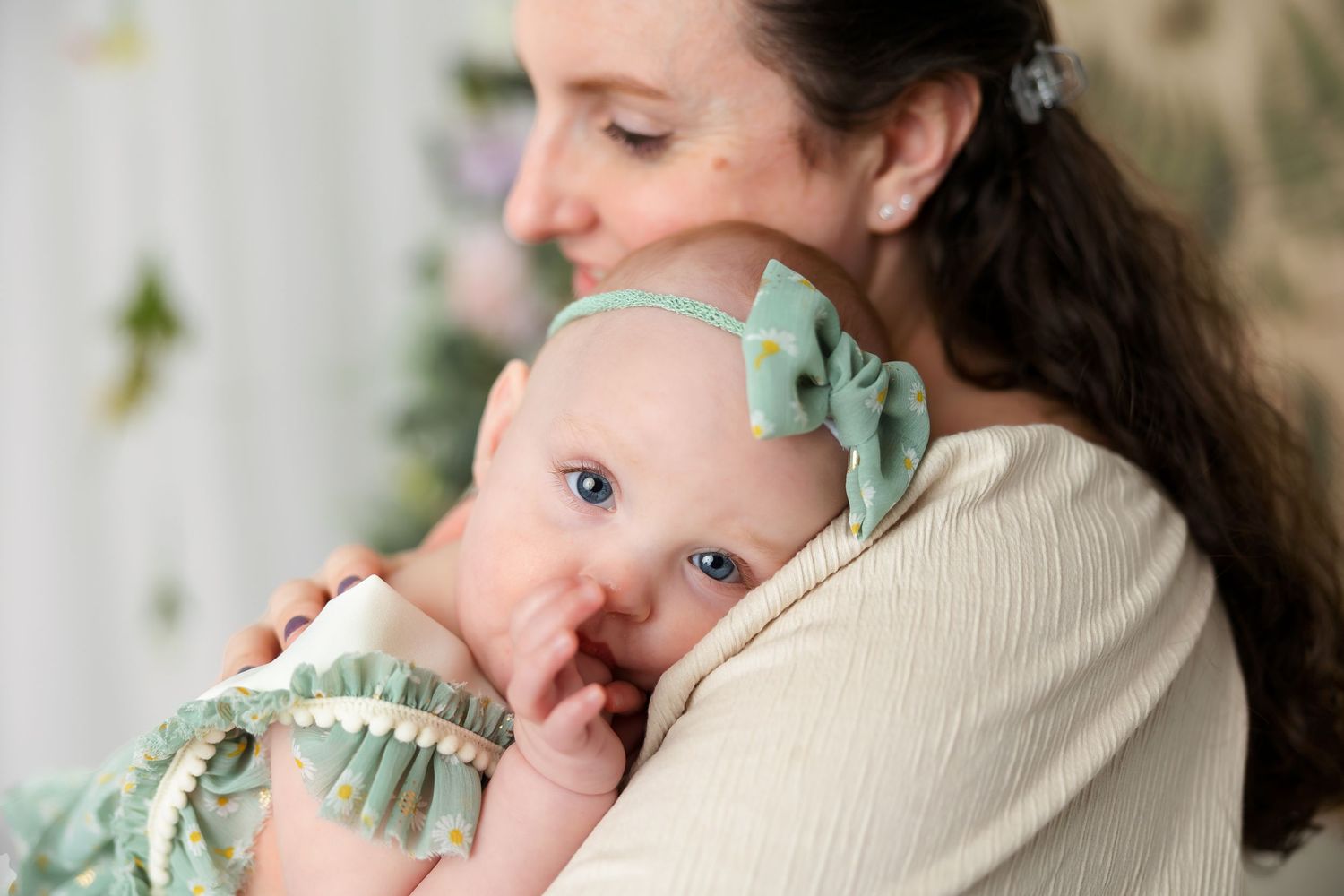 A tender moment captured of nurturing care in soft natural lighting.