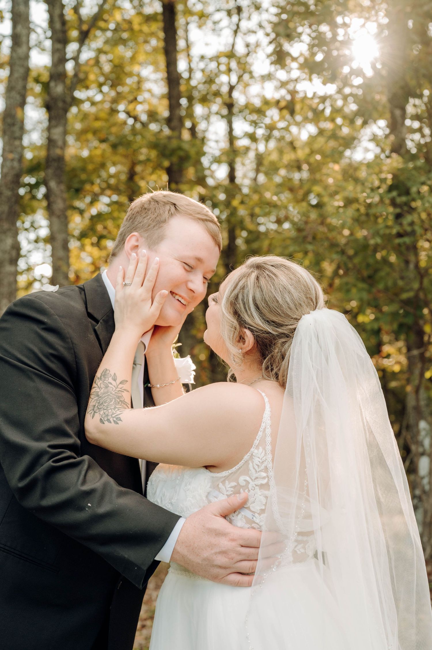 A romantic outdoor wedding photoshoot sequence showing tender moments between a couple in autumn foliage.