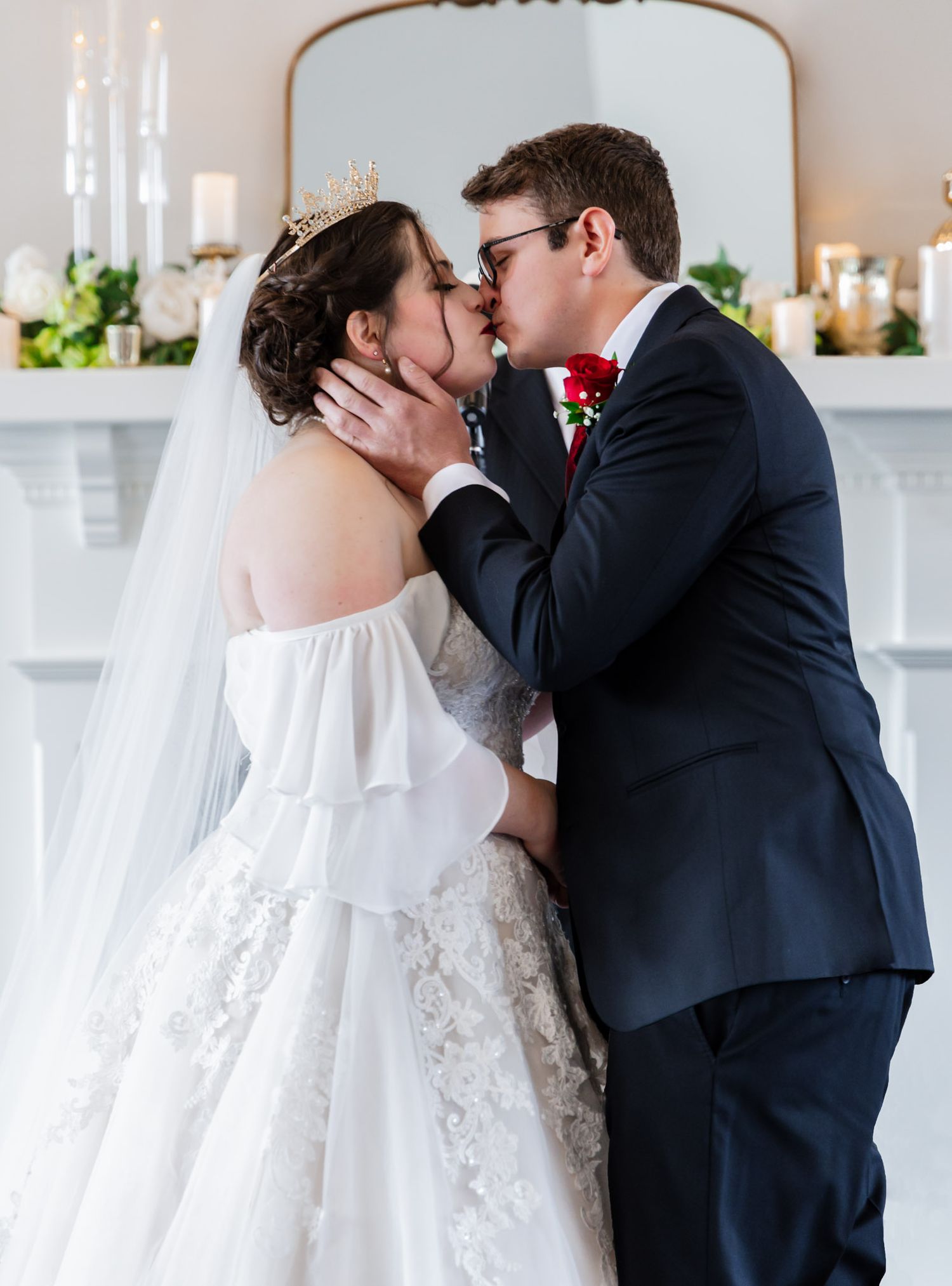 Bride and Groom share first kiss at Wedding at Sego Lily Events in West Jordan, Utah