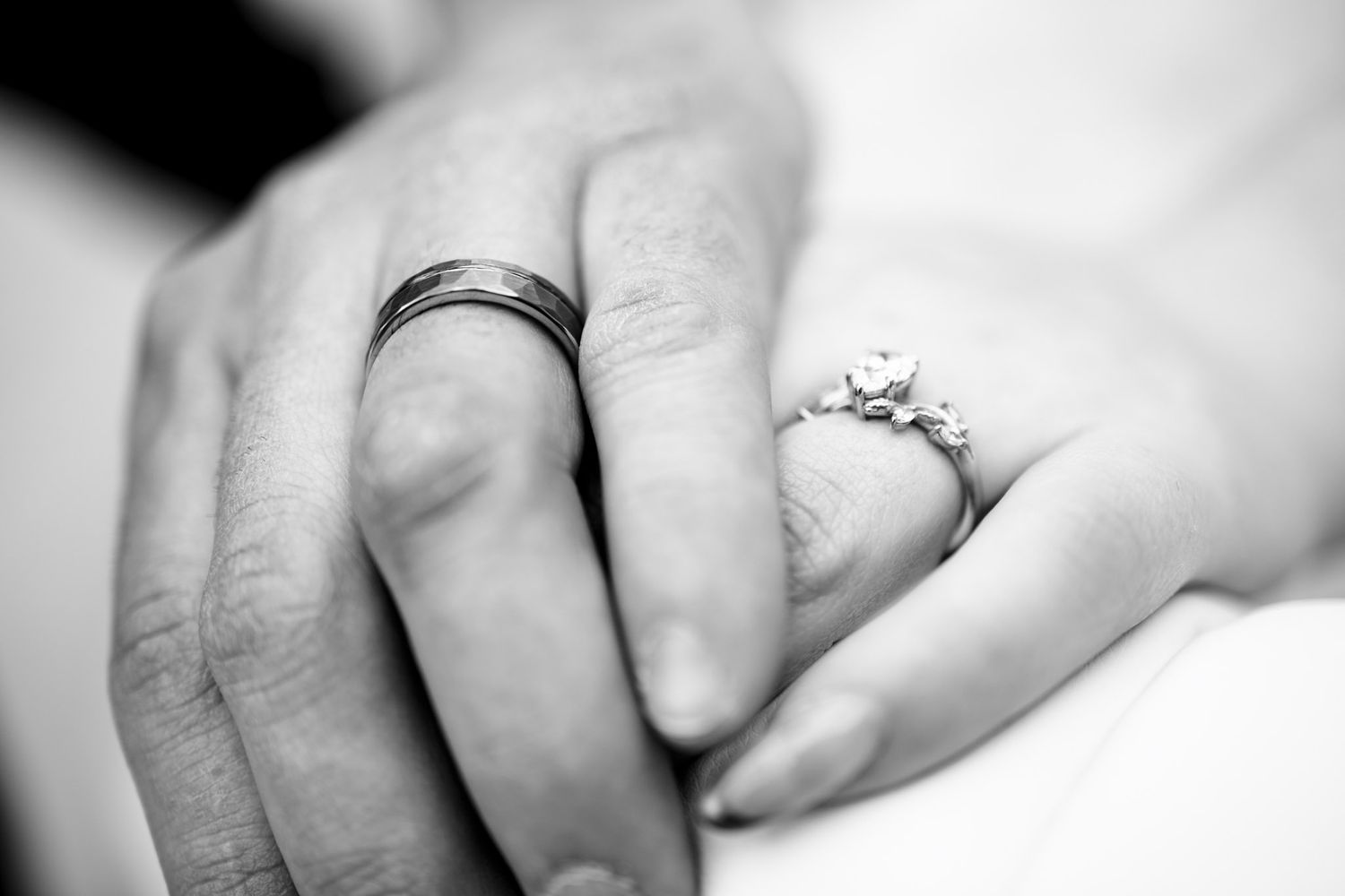 hands with wedding rings