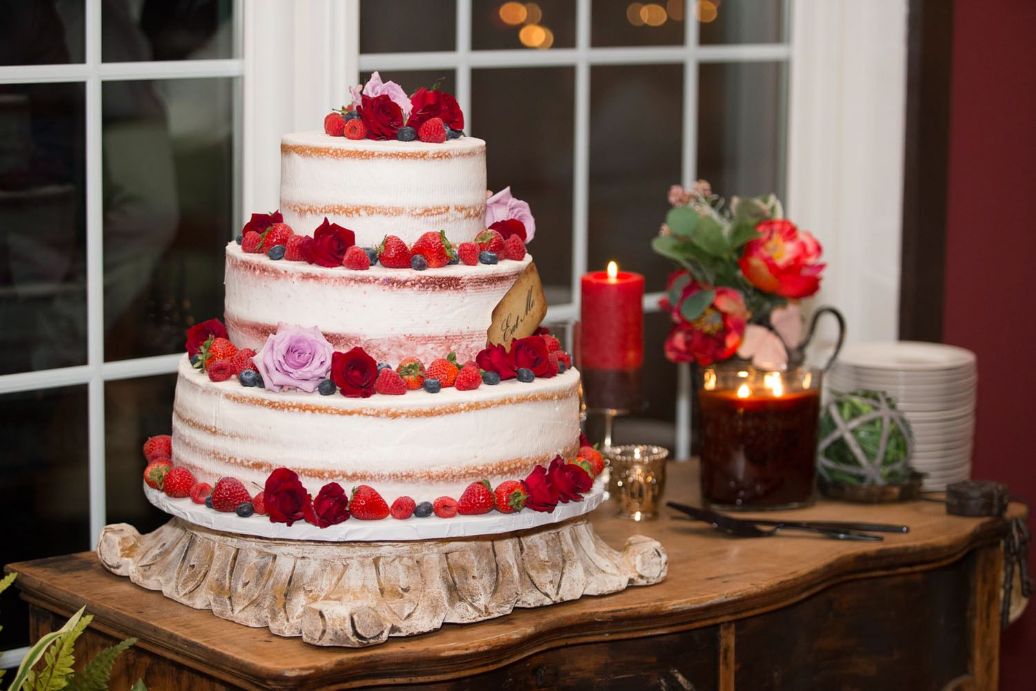 3 tier naked wedding cake with strawberries