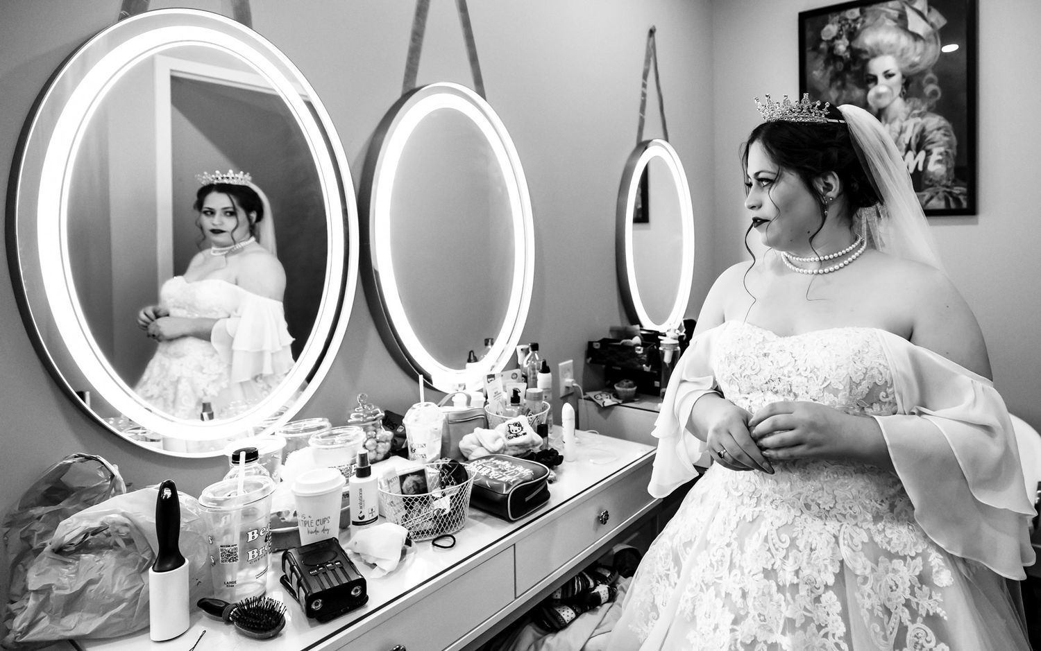 Bride looking into mirror getting ready for Wedding at Sego Lily Events, West Jordan, Utah