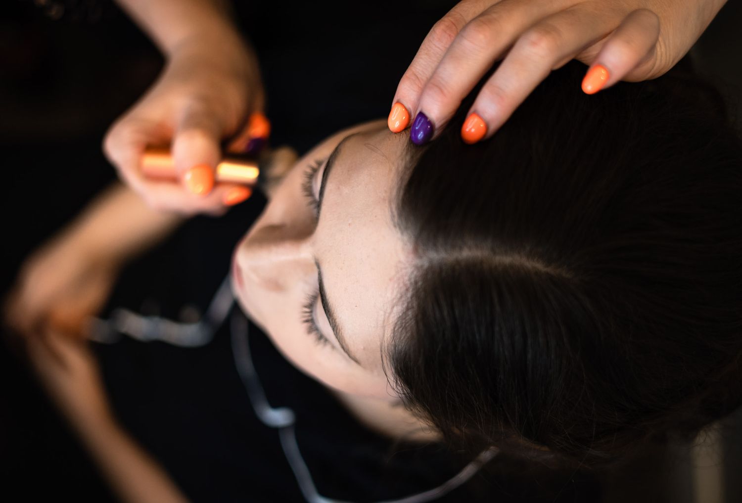 bride getting makeup done
