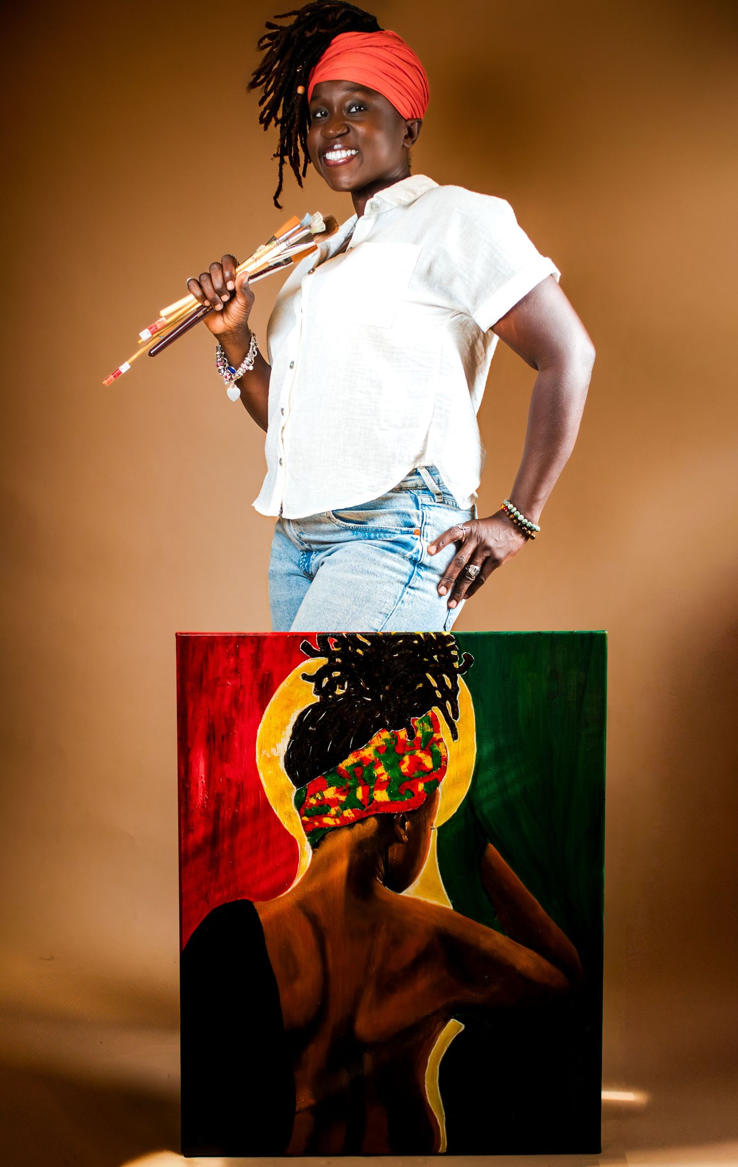 Artist performs in front of colorful red and green backdrop with dramatic lighting and expressive poses.