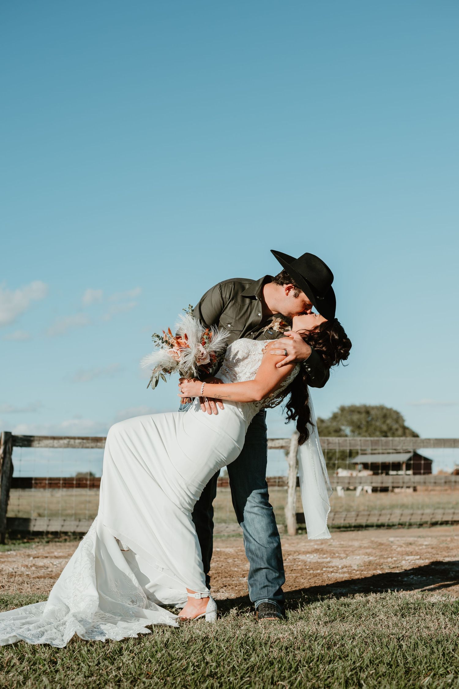 A romantic dip pose sequence showing a couple in a white dress and casual wear against a rural outdoor setting. Wedding photographer DFW