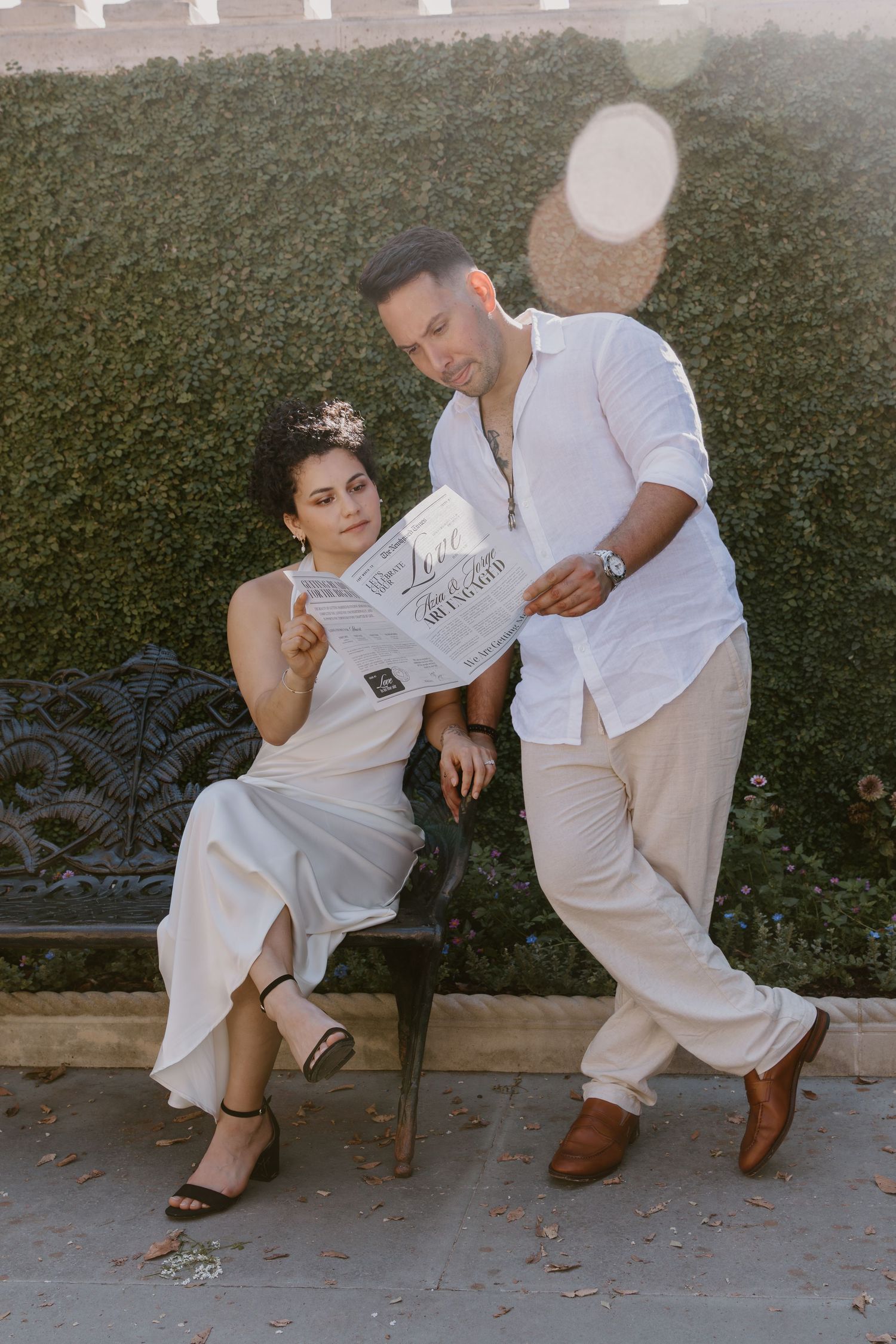 A series of candid photos showing a couple in white outfits sitting together on a bench in a garden setting.