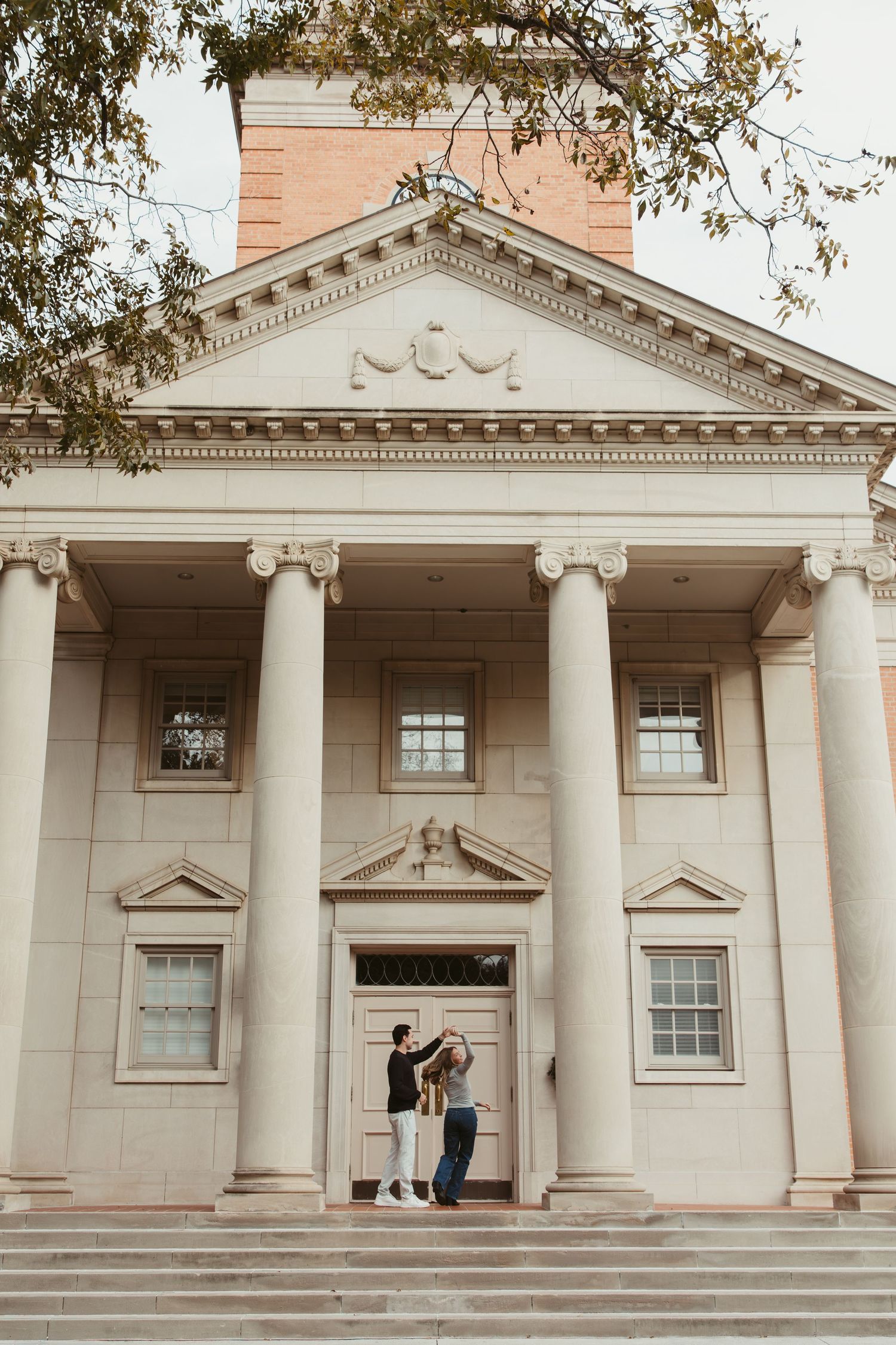 Architectural sequence showing a classic building facade with white columns and triangular pediment from different angles. engagement photos