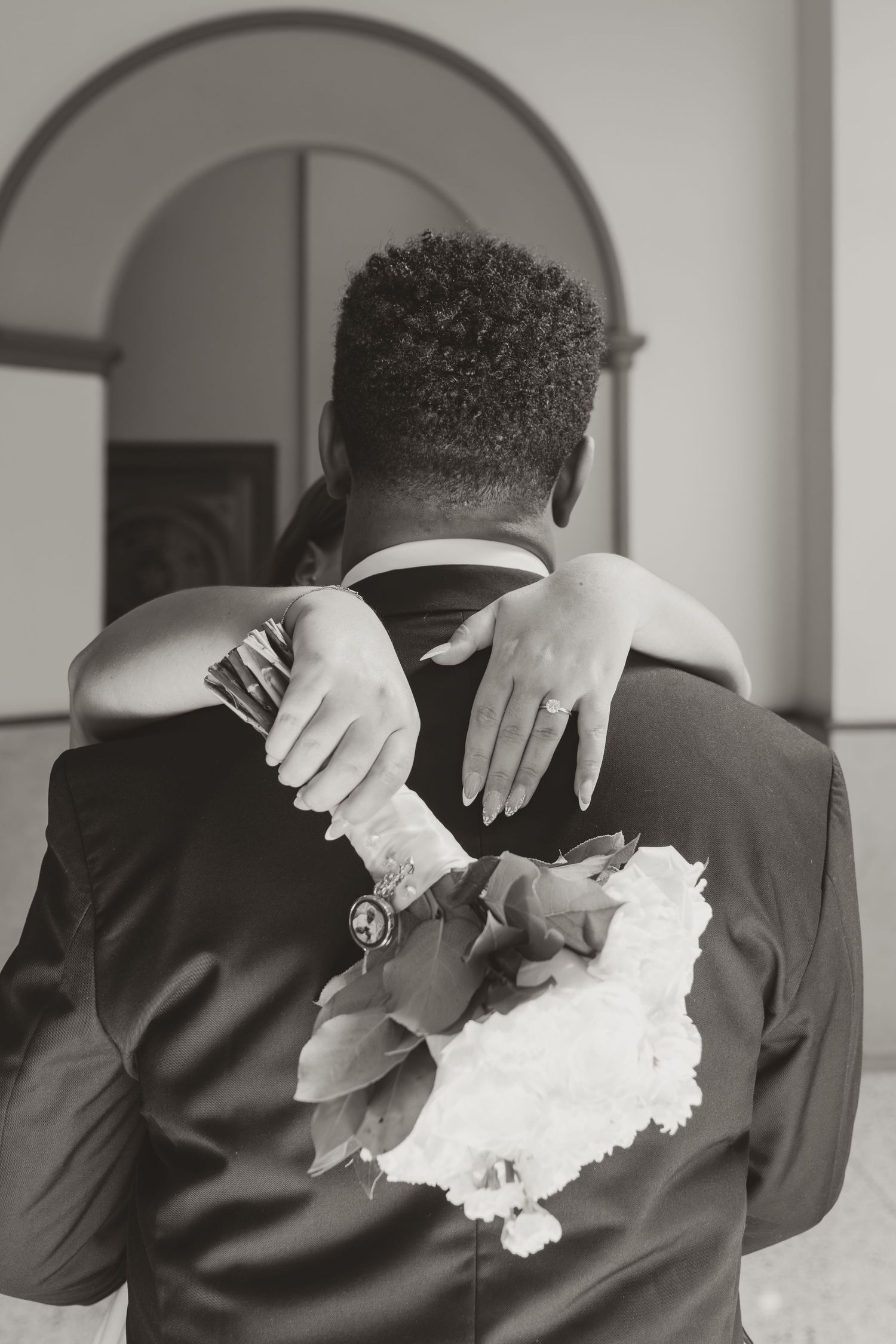 A series of black and white photos showing playful moments between a couple on their wedding day. Wedding Photographer DFW