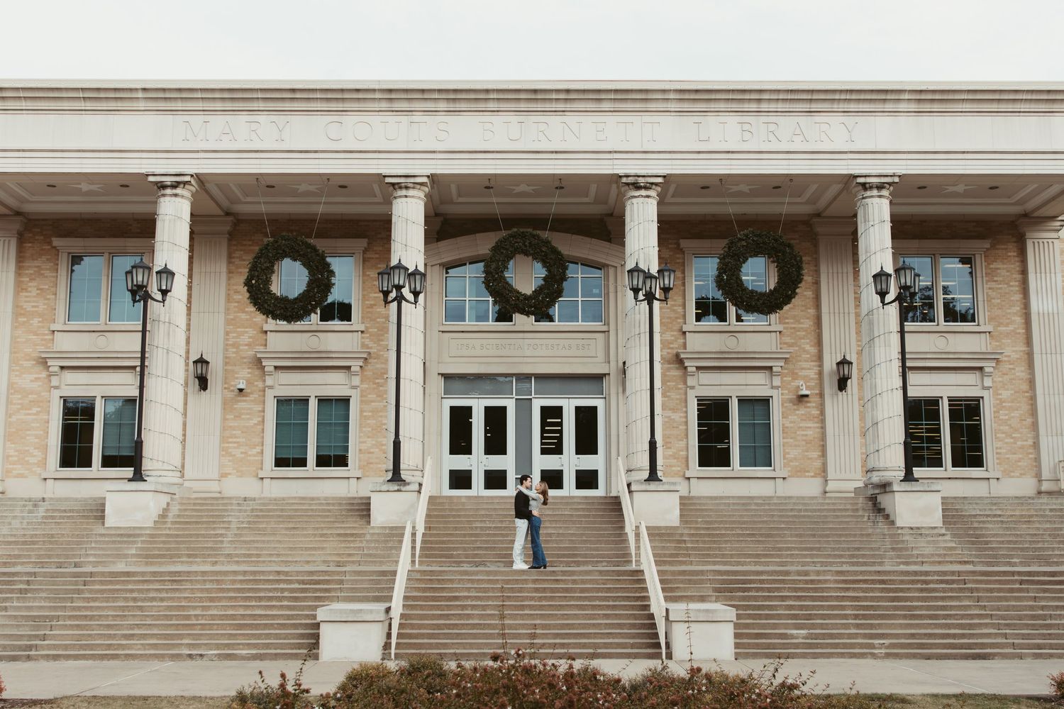 Candid engagement photos on TCU campus Fort Worth