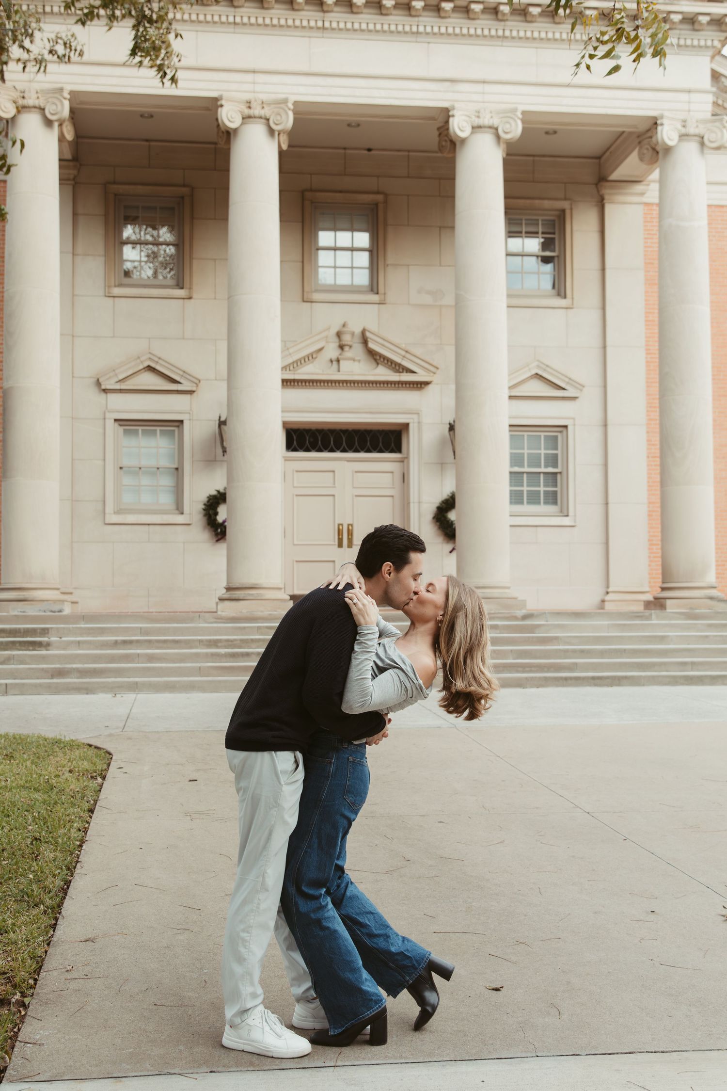 Candid engagement photos on TCU campus Fort Worth