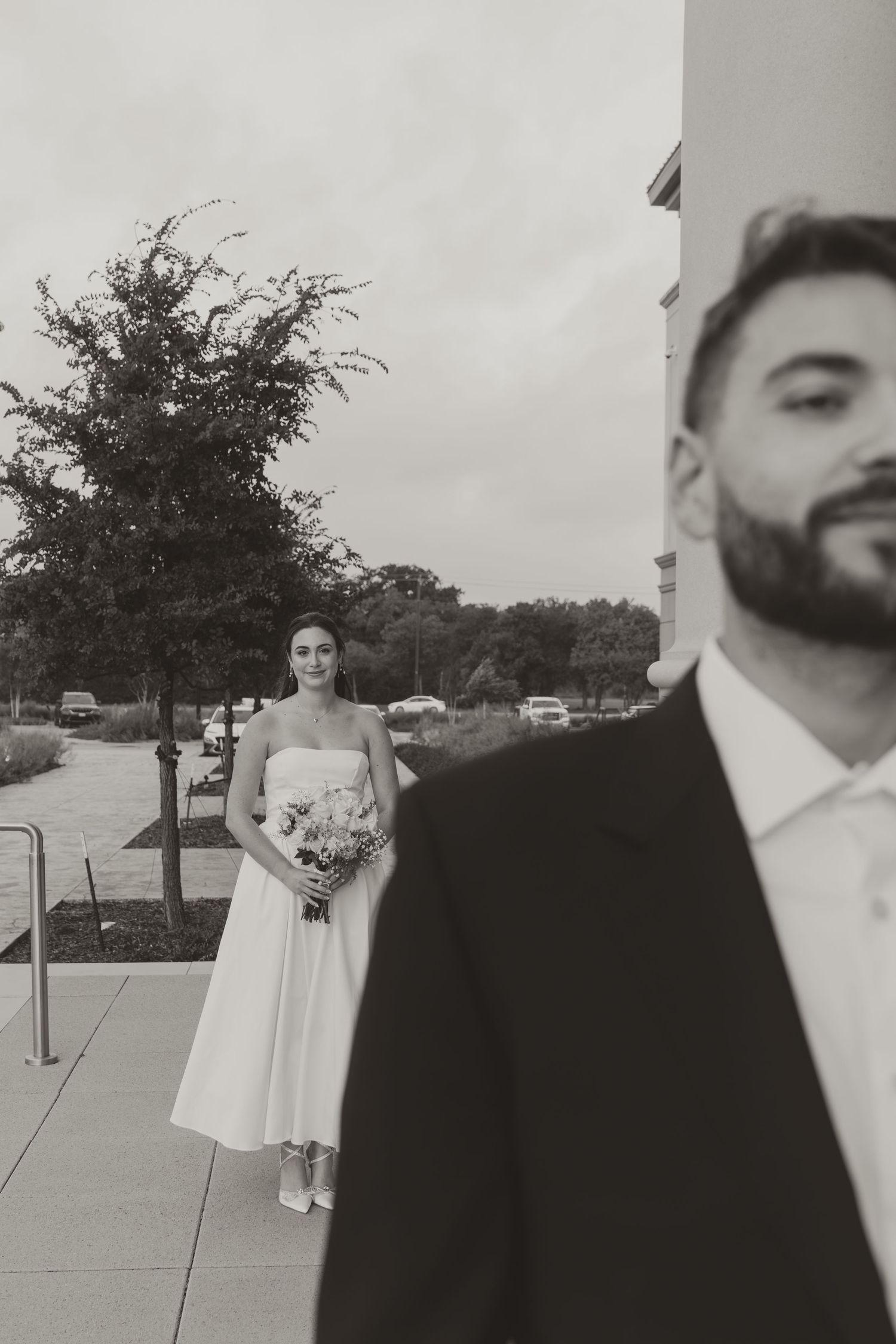 A series of black and white wedding photos showing a bride in a white dress and groom in a dark suit.