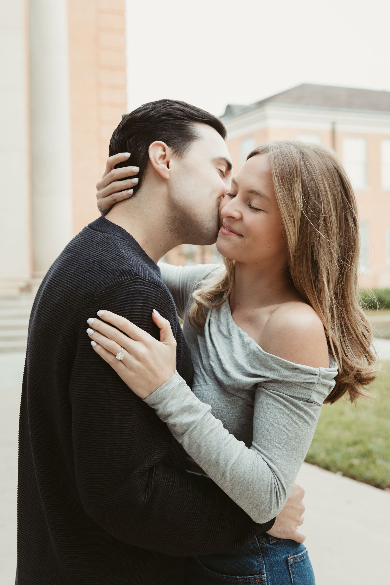 Candid engagement photos on TCU campus Fort Worth