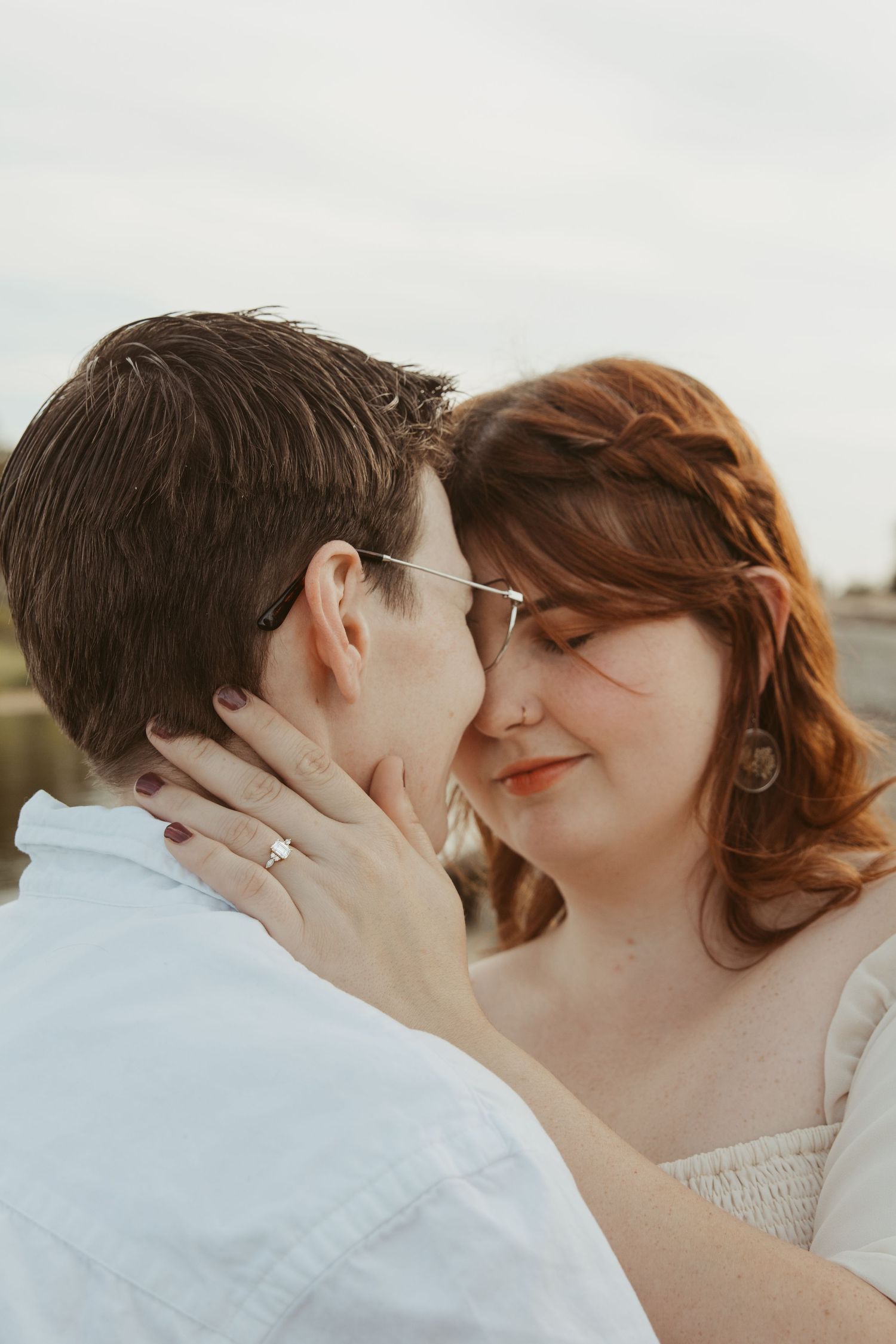 A romantic sequence of three intimate moments between a couple in soft natural lighting.