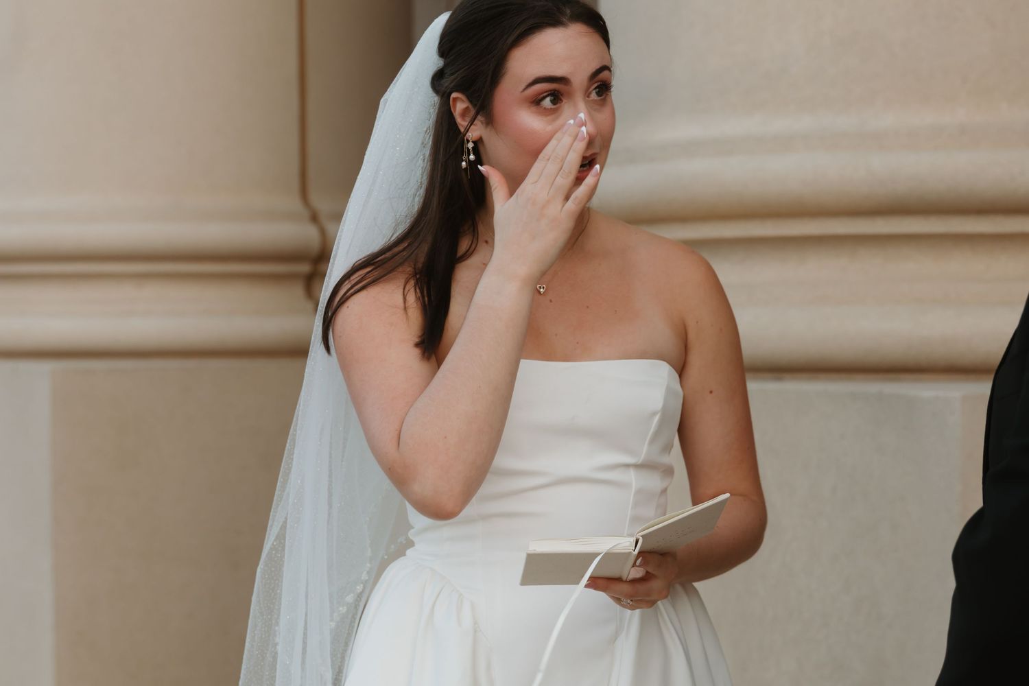 A collection of candid wedding photos showing emotional moments and reactions during a ceremony. Wedding Photographer Fort Worth