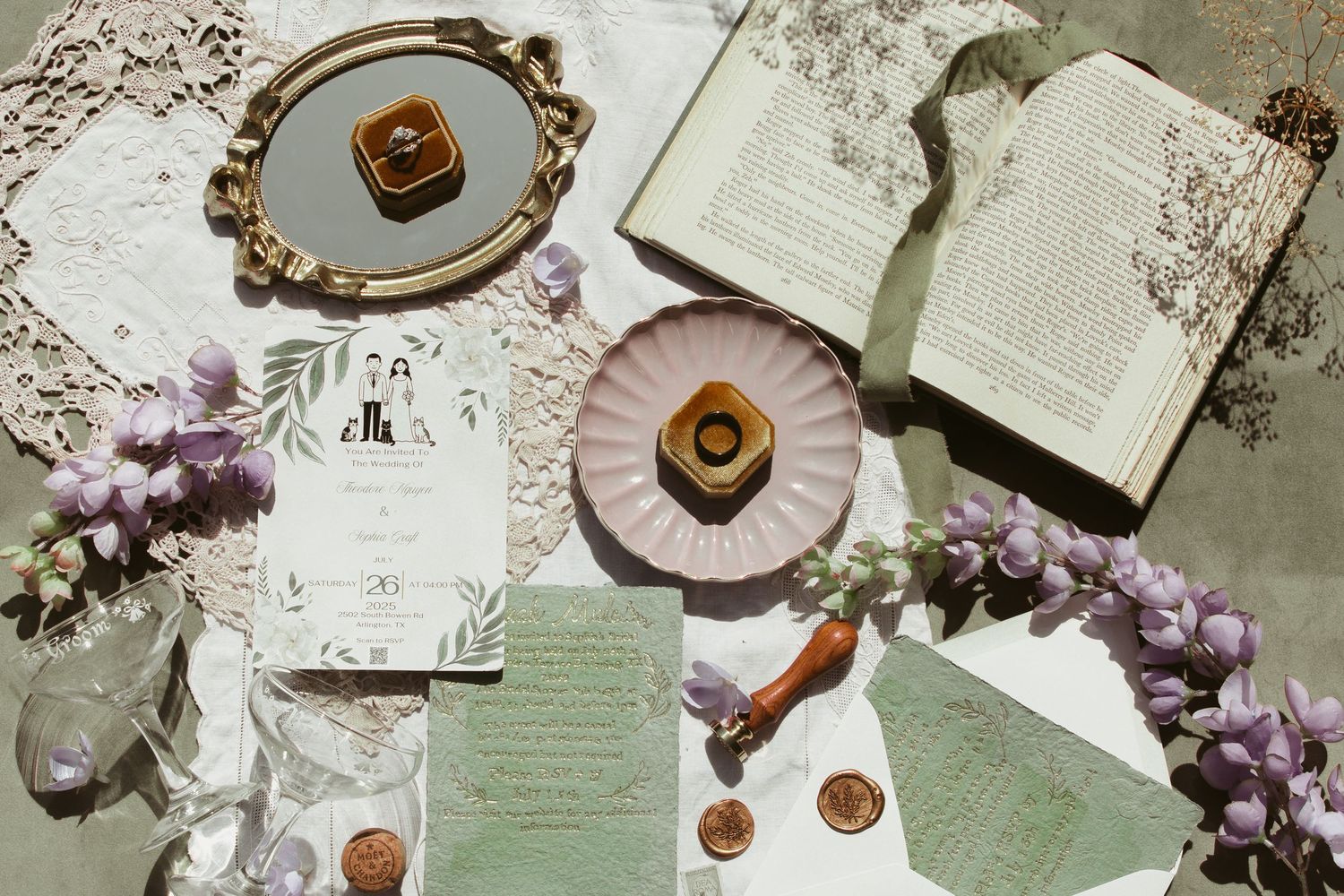 Vintage wedding invitation suite with sage green stationery, antique wax seals, and delicate purple floral accents.